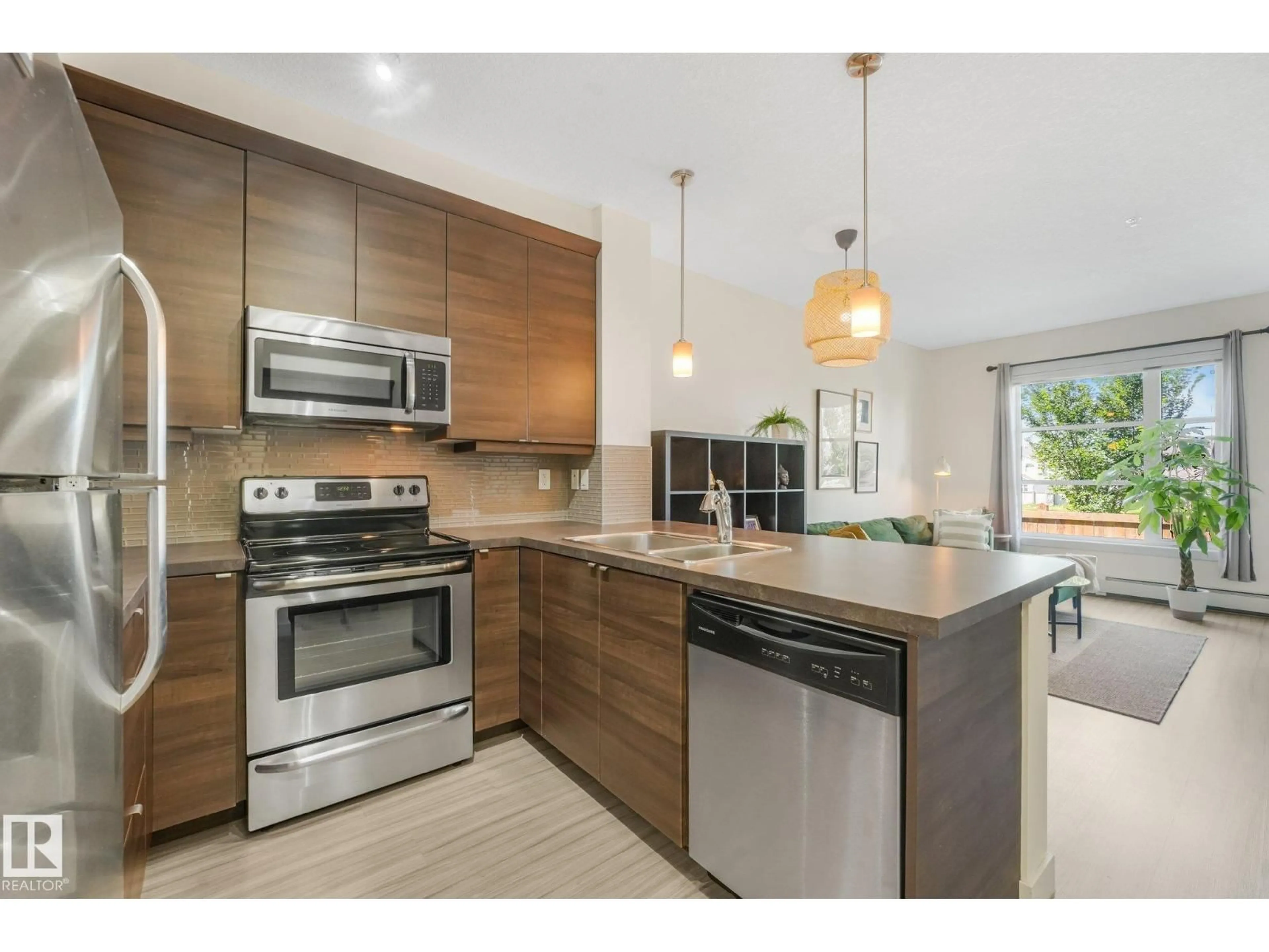 Open concept kitchen, unknown for 207 - 2590 ANDERSON WY, Edmonton Alberta T6W0R2