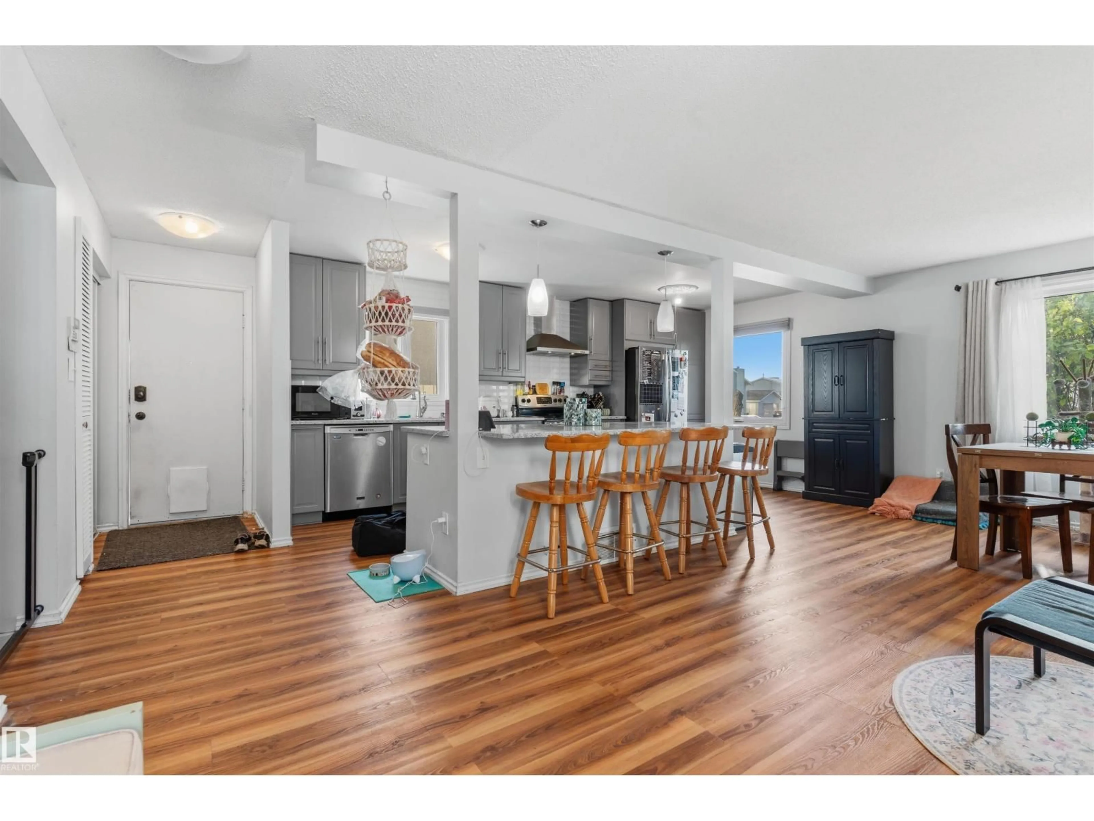 Open concept kitchen, wood/laminate floor for NW - 17005 95 ST, Edmonton Alberta T5Z2A7