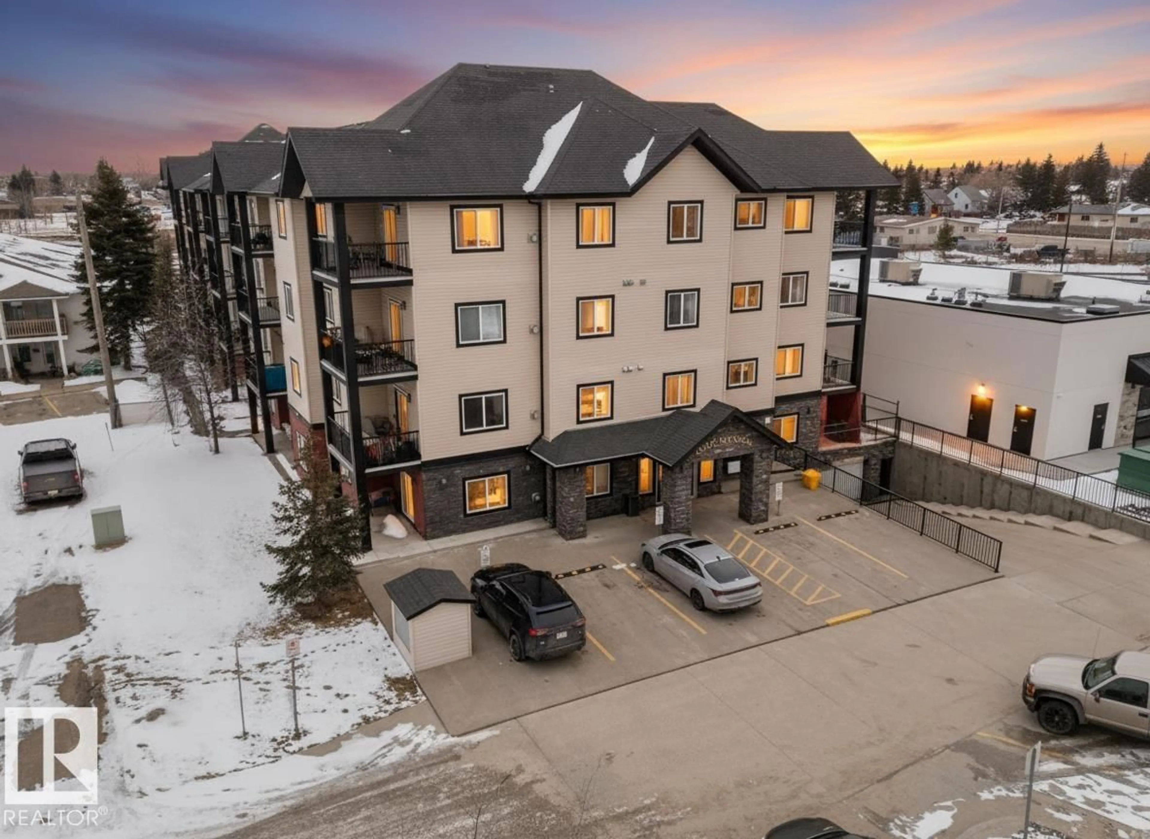 A pic from outside/outdoor area/front of a property/back of a property/a pic from drone, building for 211 - 4415 48 ST, Leduc Alberta T9E5Y2