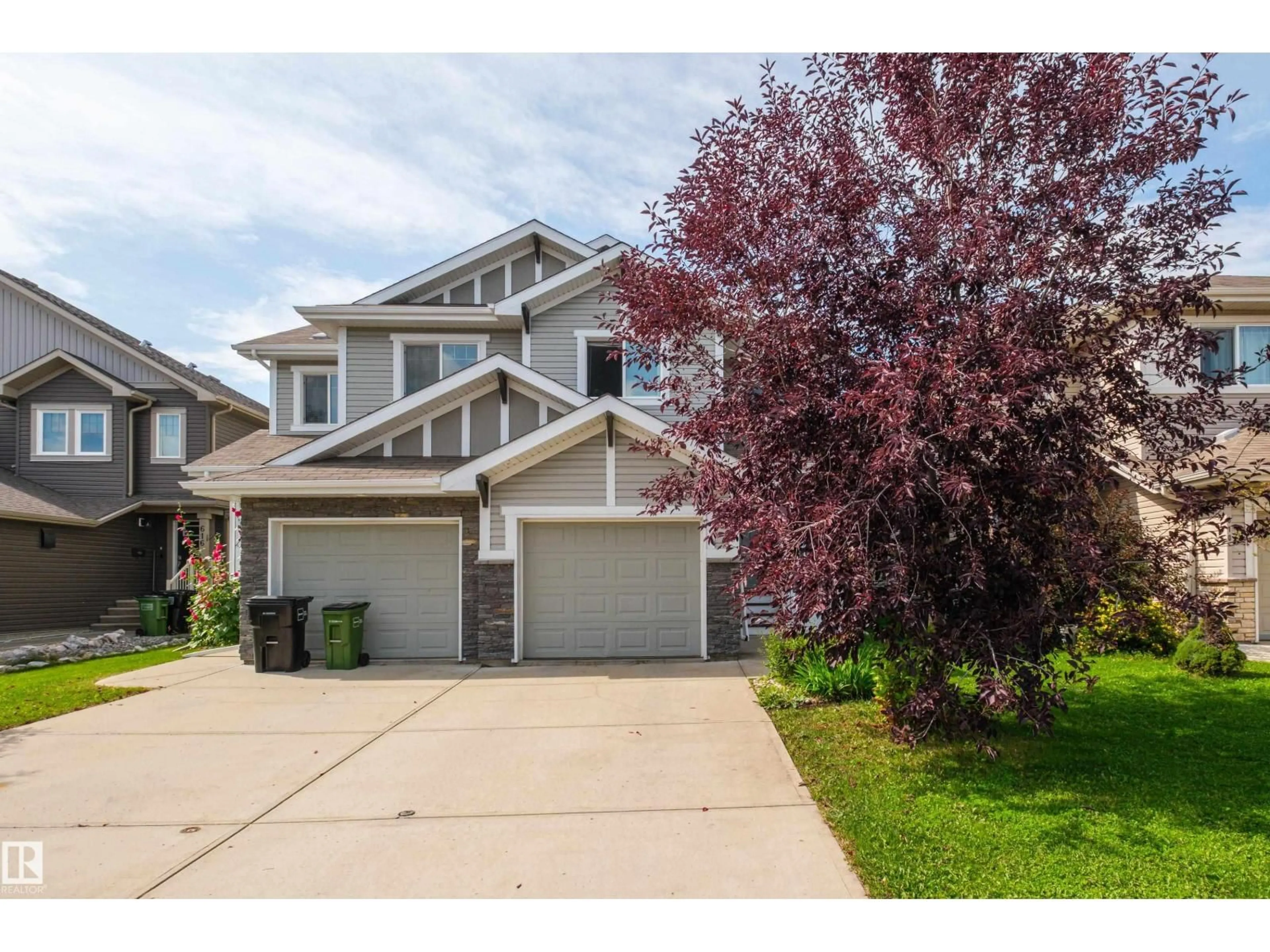 Home with vinyl exterior material, street for SW - 612 175A ST, Edmonton Alberta T6W2G5