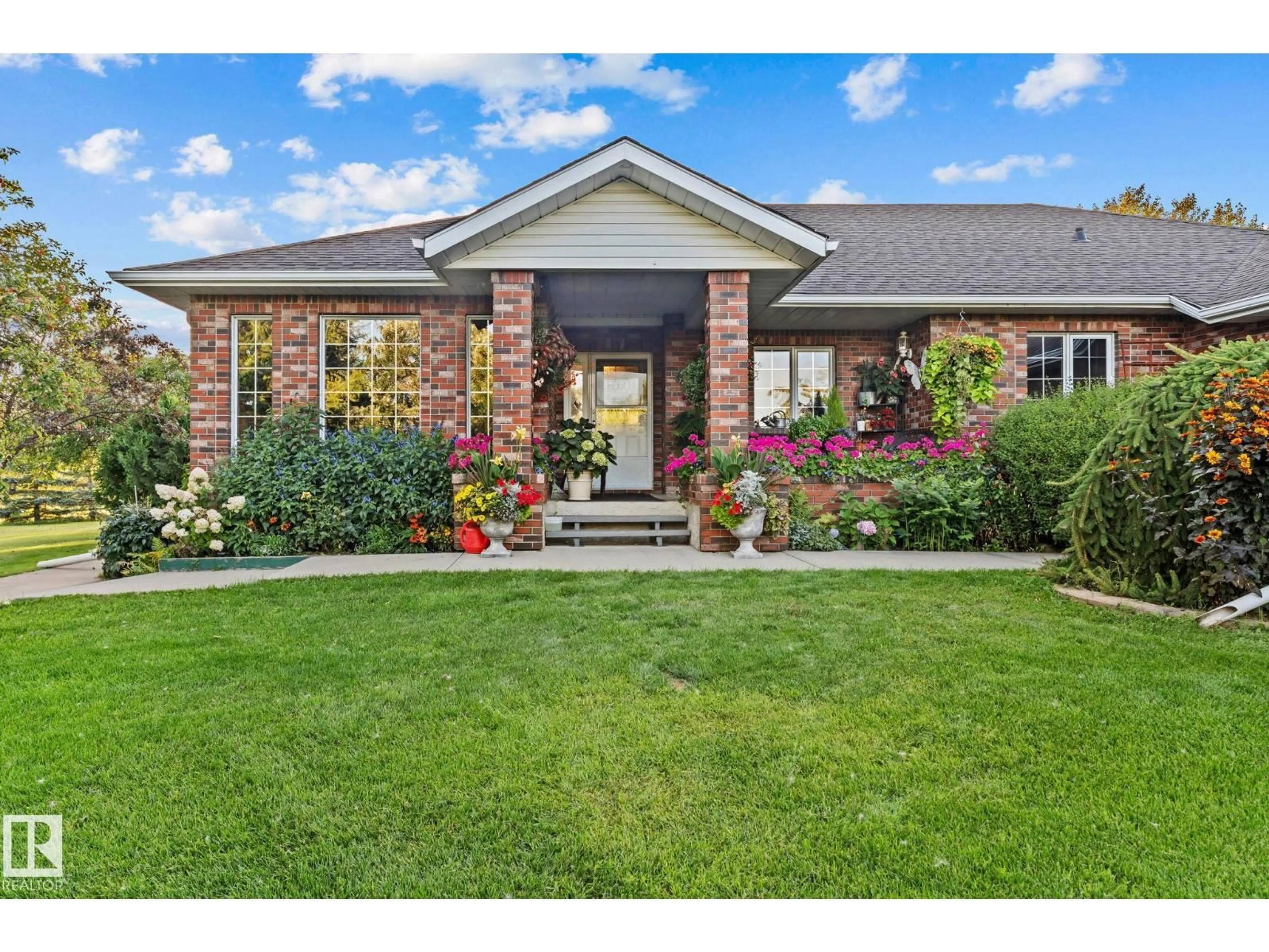 Home with brick exterior material, street for 54224 RGE ROAD 245, Rural Sturgeon County Alberta T8T0A6