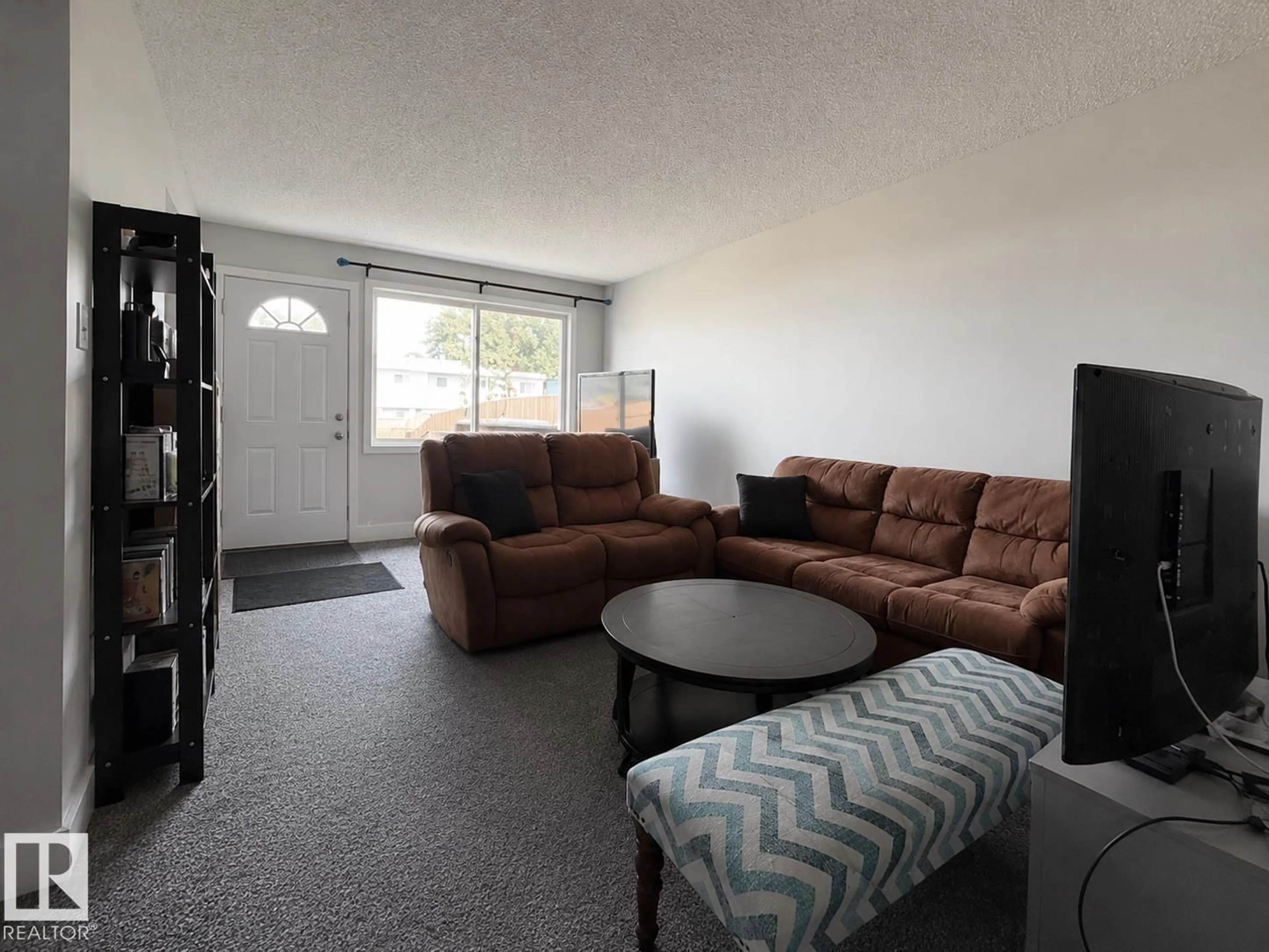 Living room with furniture, unknown for #2 - 18315 89 AV, Edmonton Alberta T5T1X2