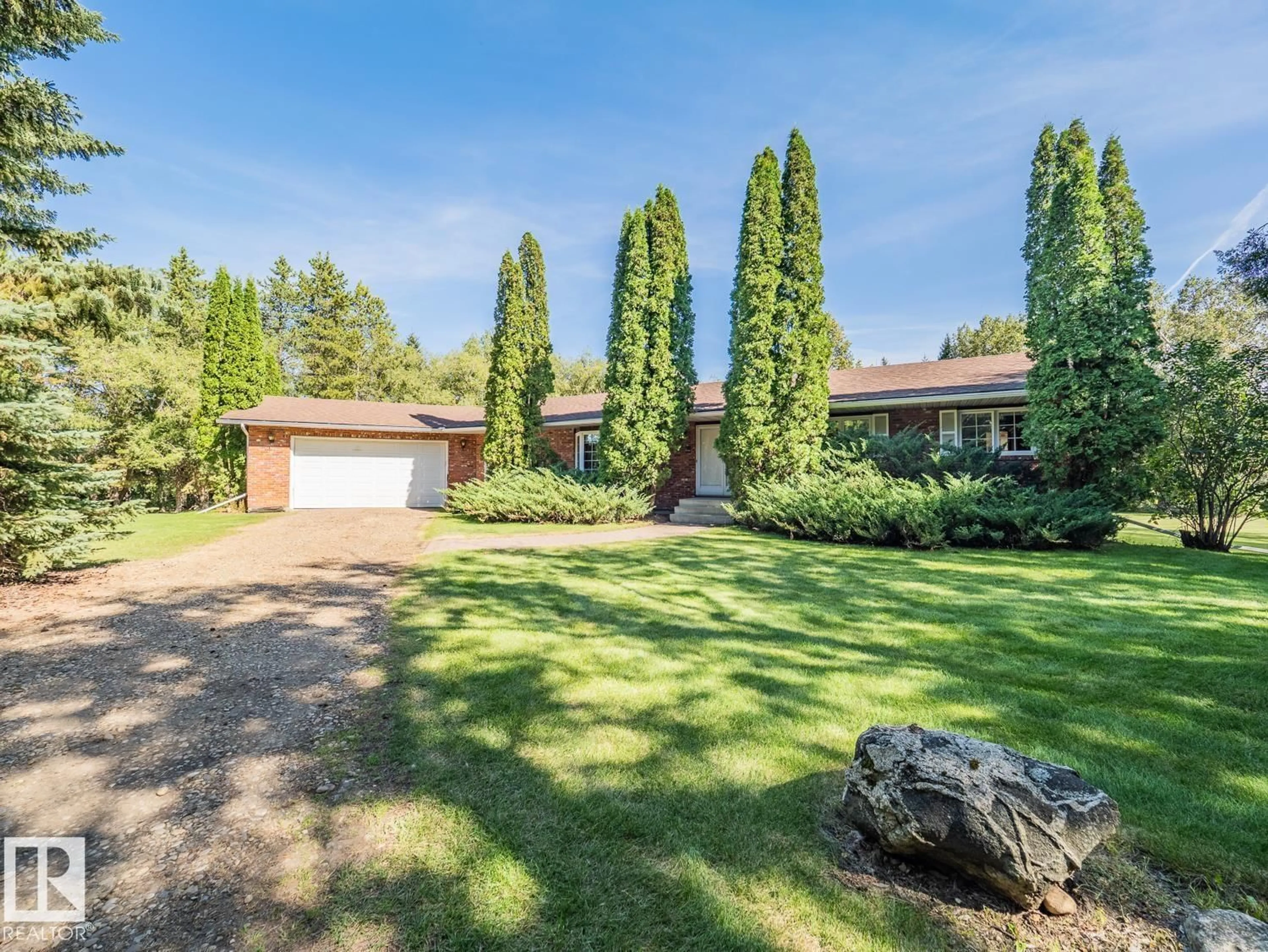 A pic from outside/outdoor area/front of a property/back of a property/a pic from drone, unknown for 1090 50242 RGE RD 244A, Rural Leduc County Alberta T4X0P4