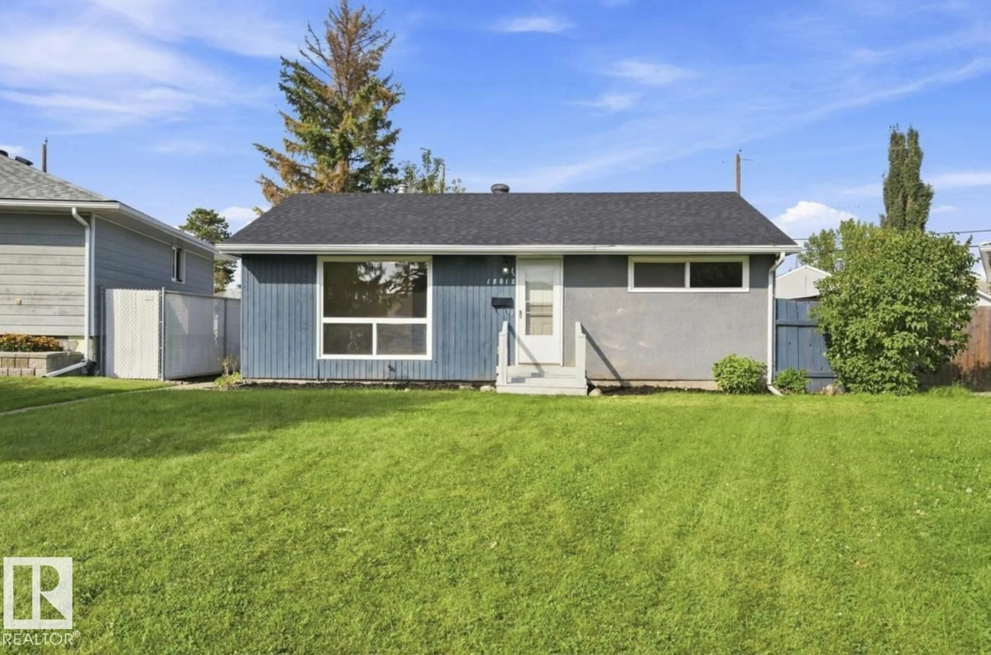 Home with vinyl exterior material, street for 15812 110A AV, Edmonton Alberta T5P1H7