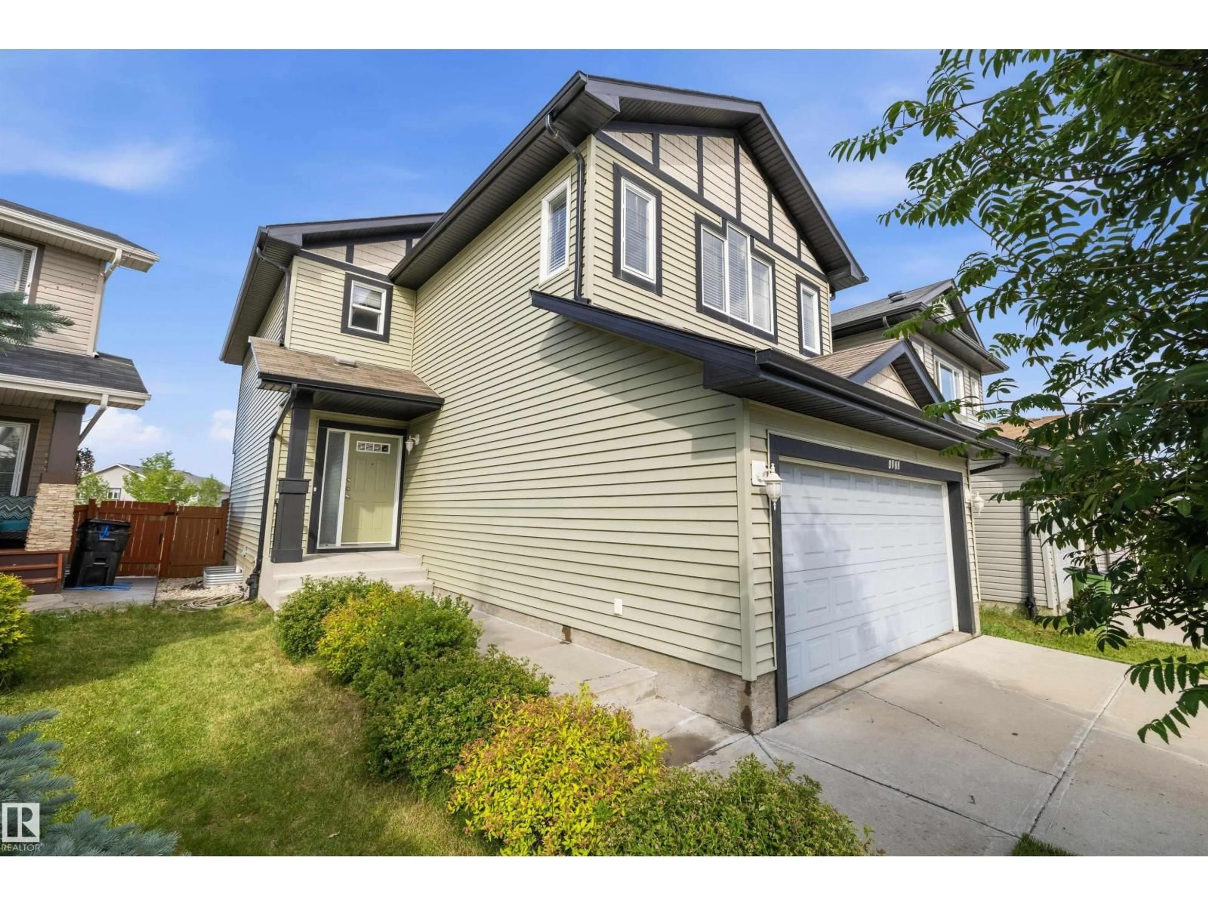 Home with vinyl exterior material, street for 4020 166 AV, Edmonton Alberta T5Y0N9