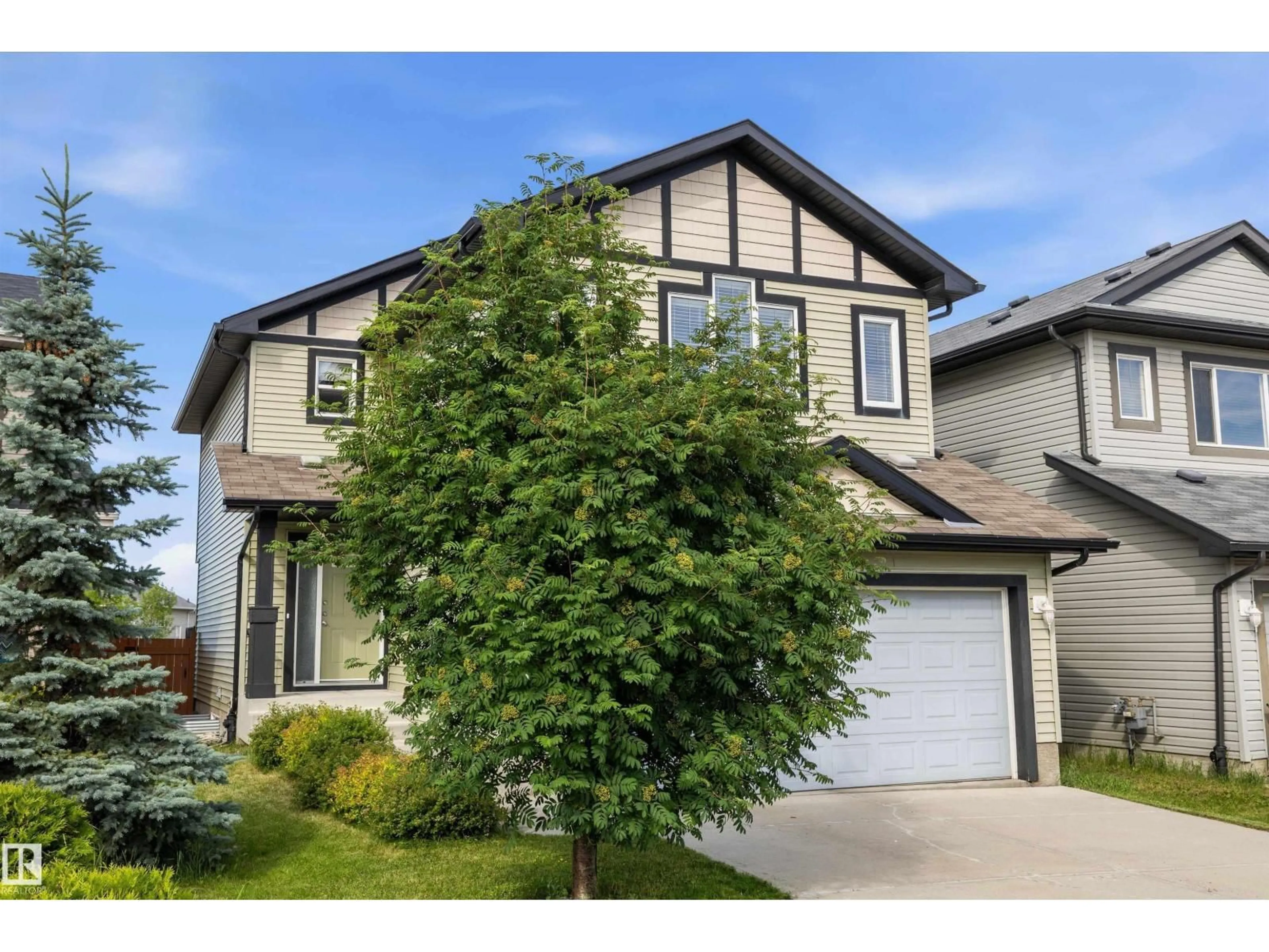 Home with vinyl exterior material, street for 4020 166 AV, Edmonton Alberta T5Y0N9