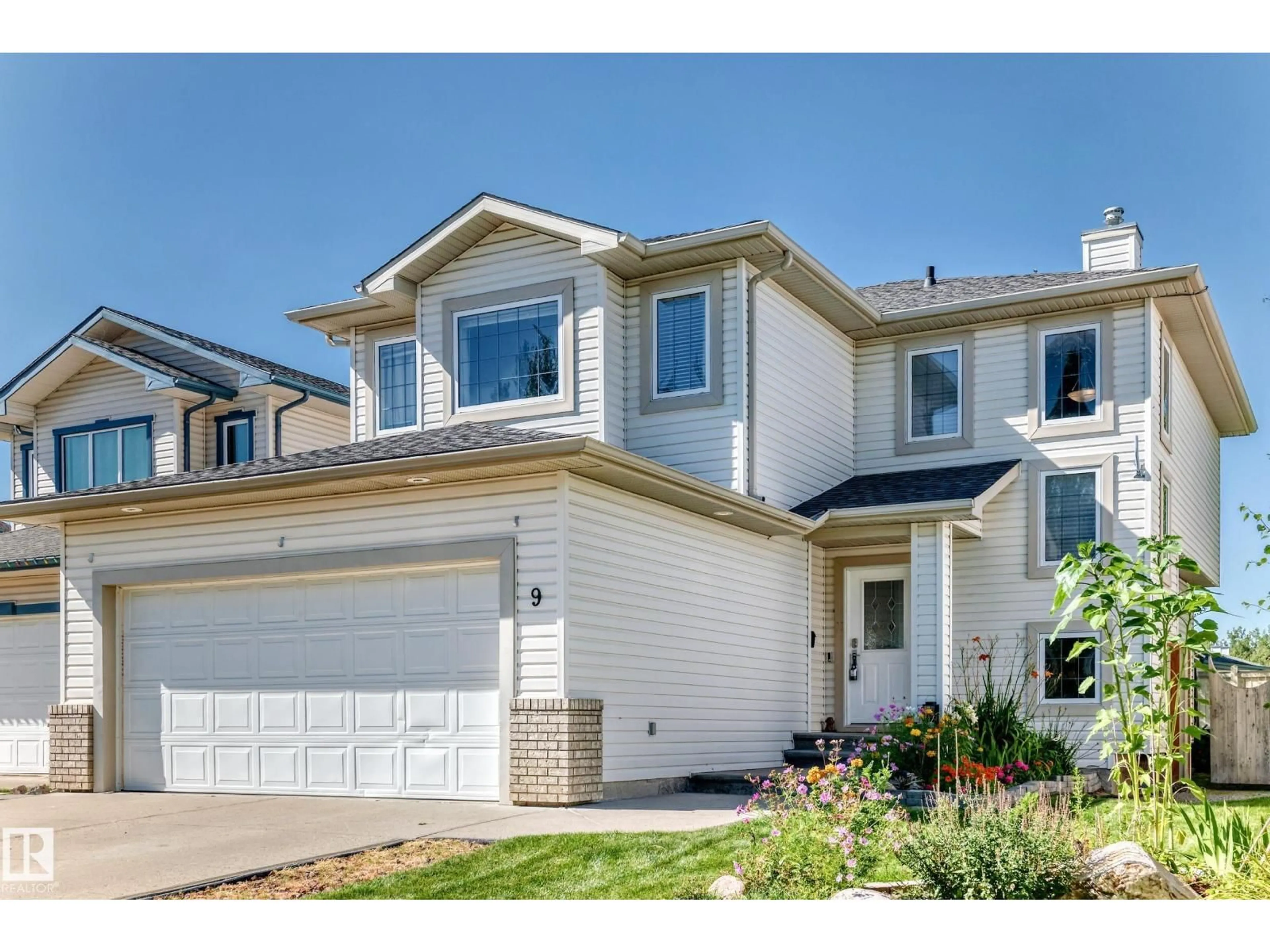 Home with vinyl exterior material, street for 9 ESCADA CL, St. Albert Alberta T8N6X5