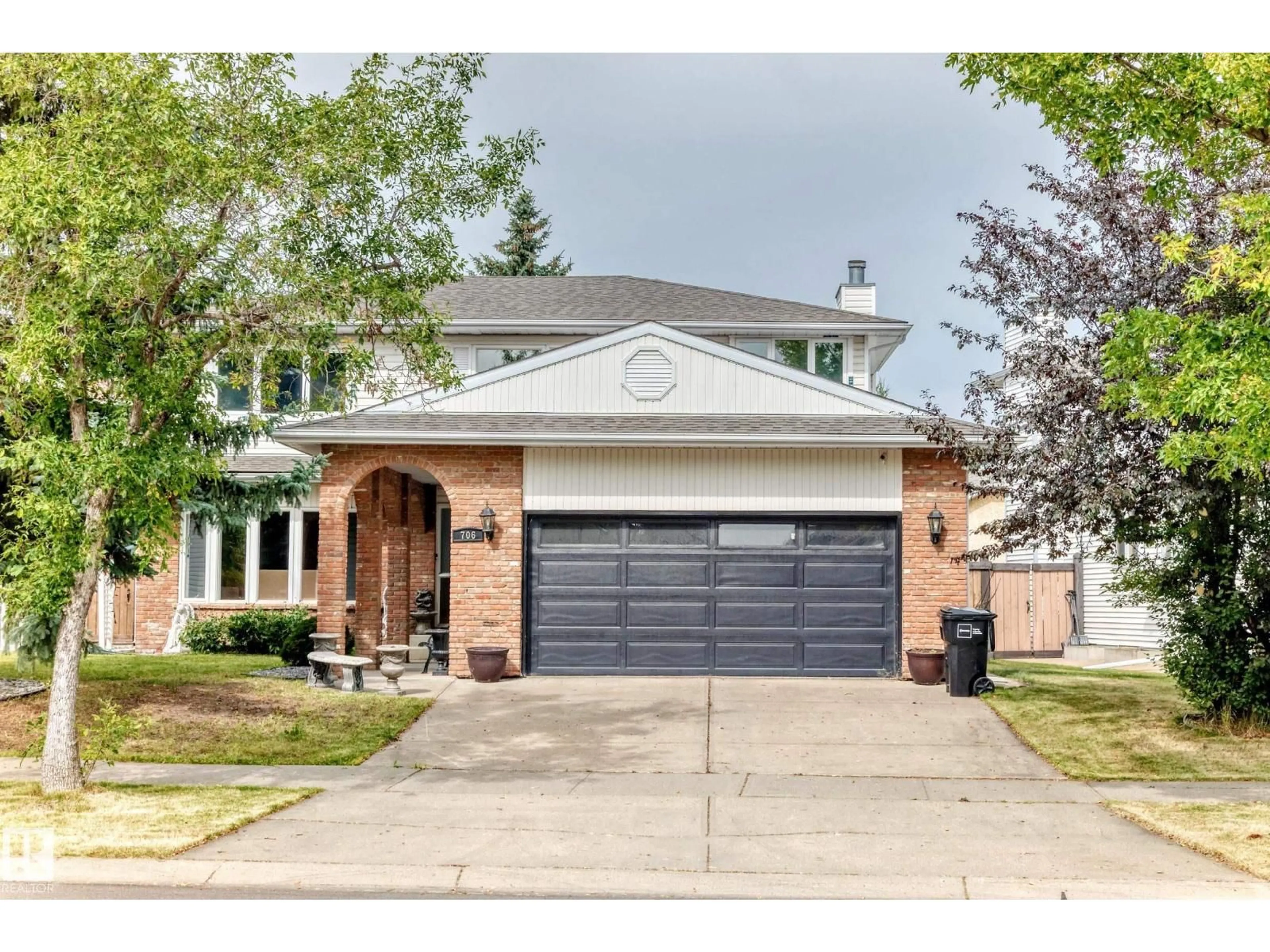 Home with brick exterior material, street for 706 BURLEY DR, Edmonton Alberta T6R1Y2