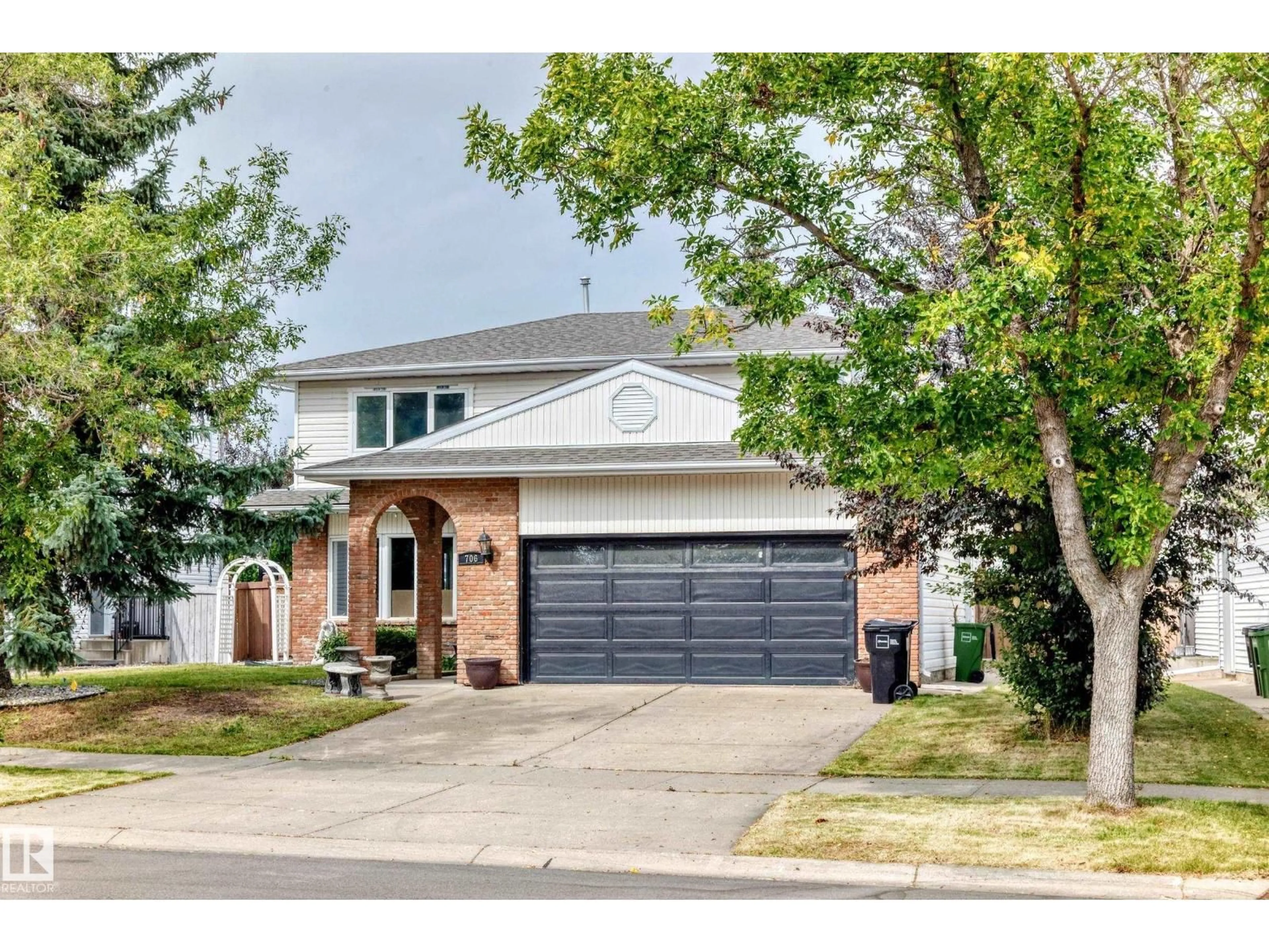 Home with brick exterior material, street for 706 BURLEY DR, Edmonton Alberta T6R1Y2