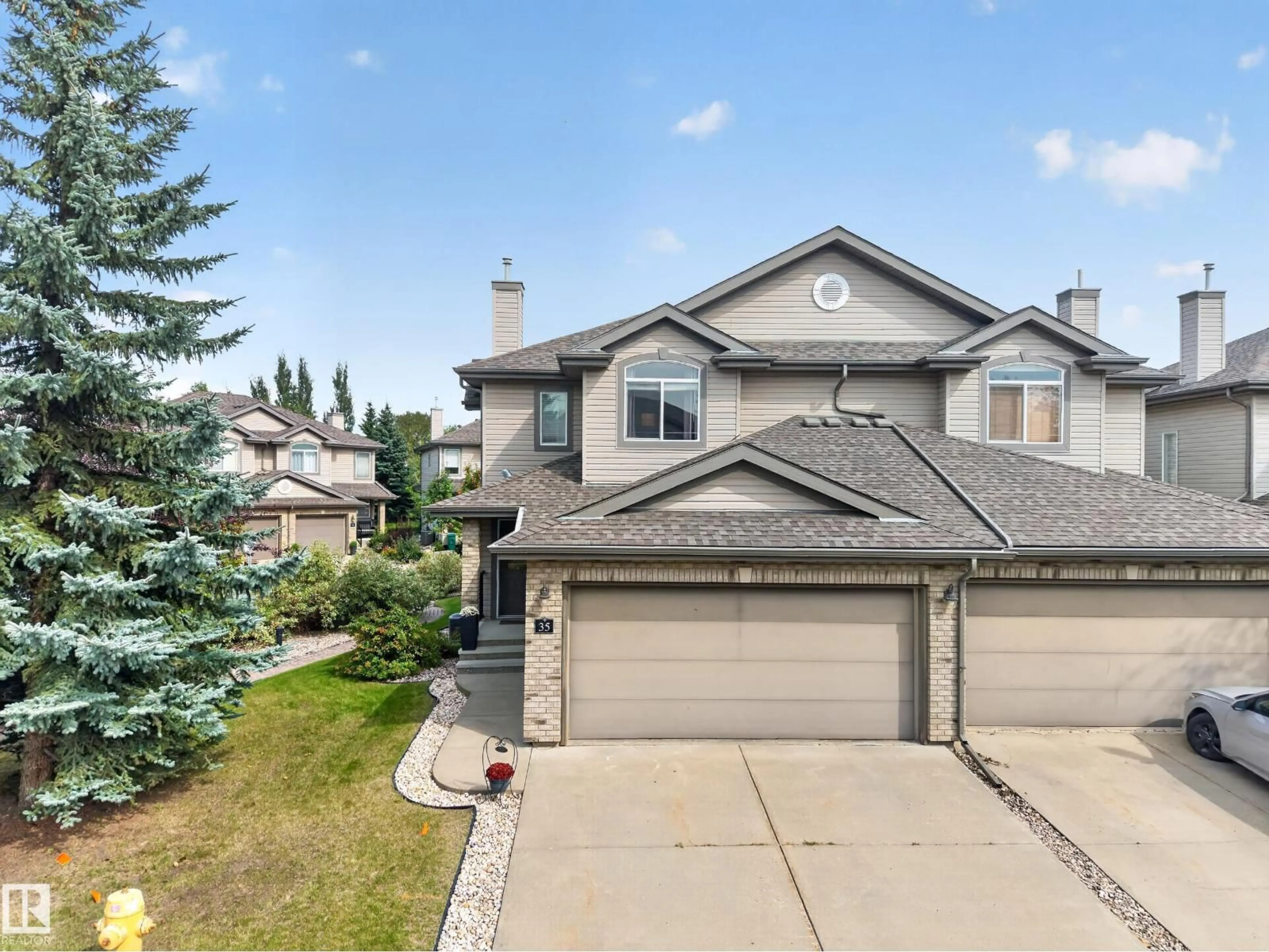 A pic from outside/outdoor area/front of a property/back of a property/a pic from drone, street for 20 - 35 NORMAN CO, St. Albert Alberta T8N7K4