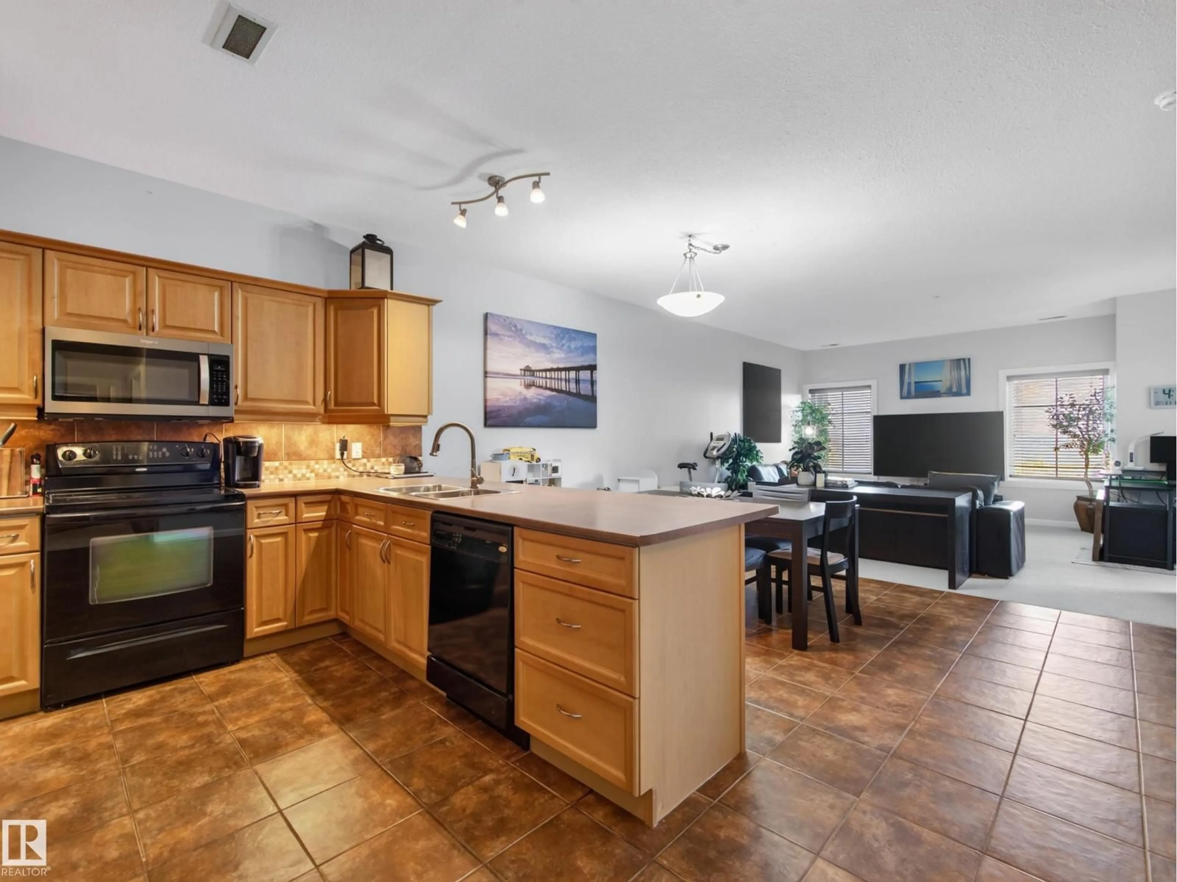 Open concept kitchen, ceramic/tile floor for 160 - 332 MAGRATH RD, Edmonton Alberta T6R3T7