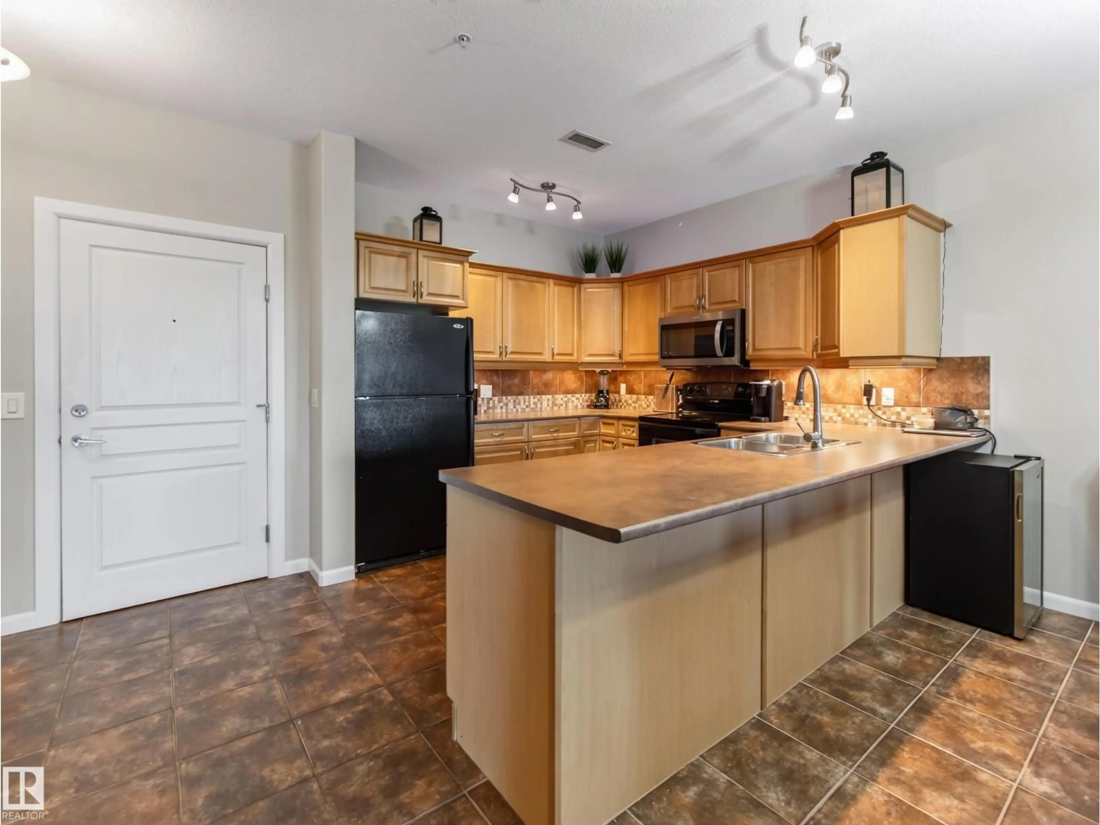 Open concept kitchen, unknown for 160 - 332 MAGRATH RD, Edmonton Alberta T6R3T7