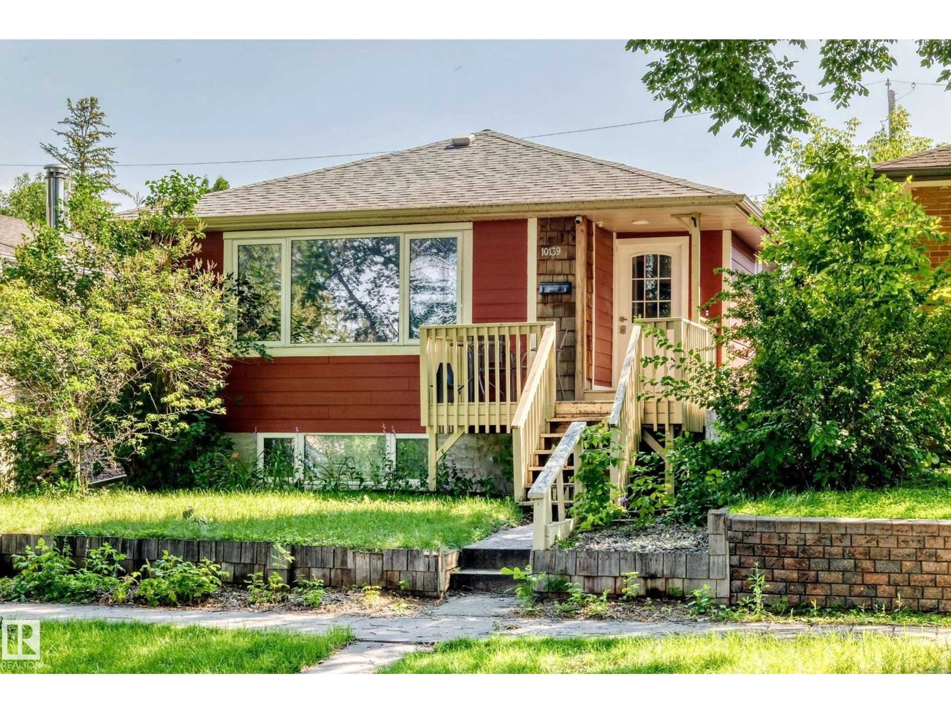 Home with brick exterior material, street for NW - 10139 74 ST, Edmonton Alberta T6A2X8