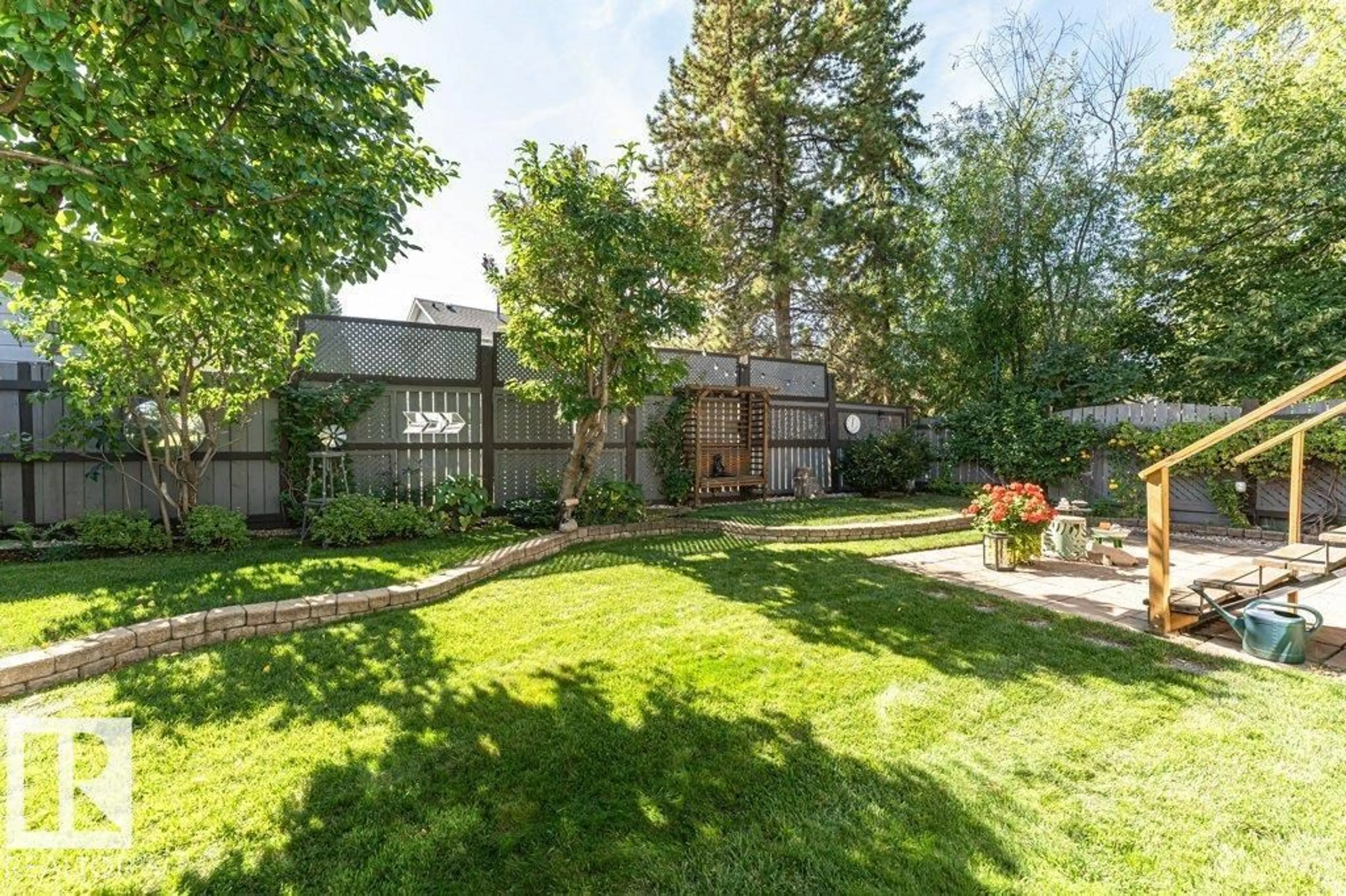 Patio, forest/trees view for 10439 14 AV NW, Edmonton Alberta T6J5R7