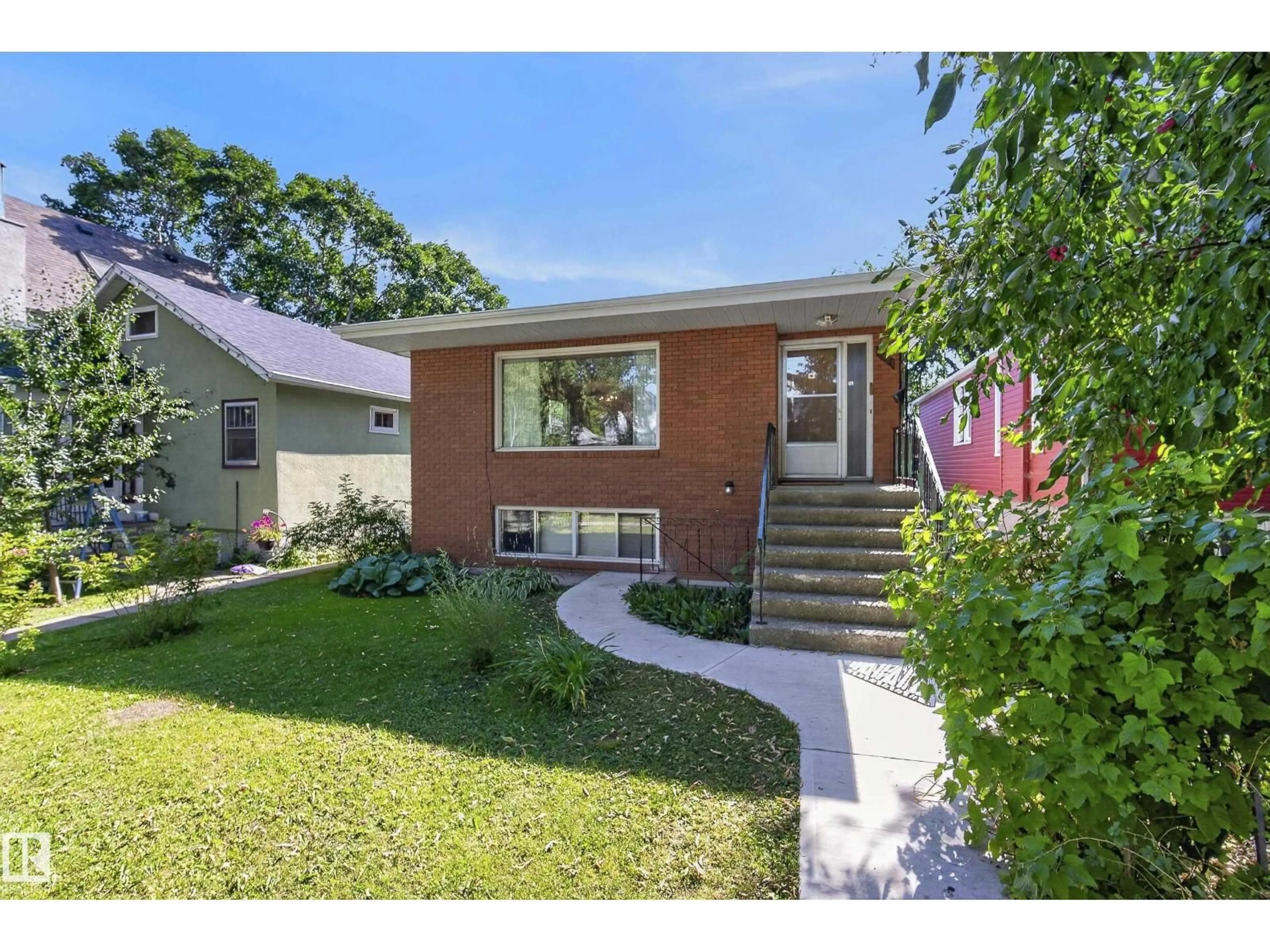 Home with brick exterior material, street for NW - 9821 83 AV, Edmonton Alberta T6E2B8