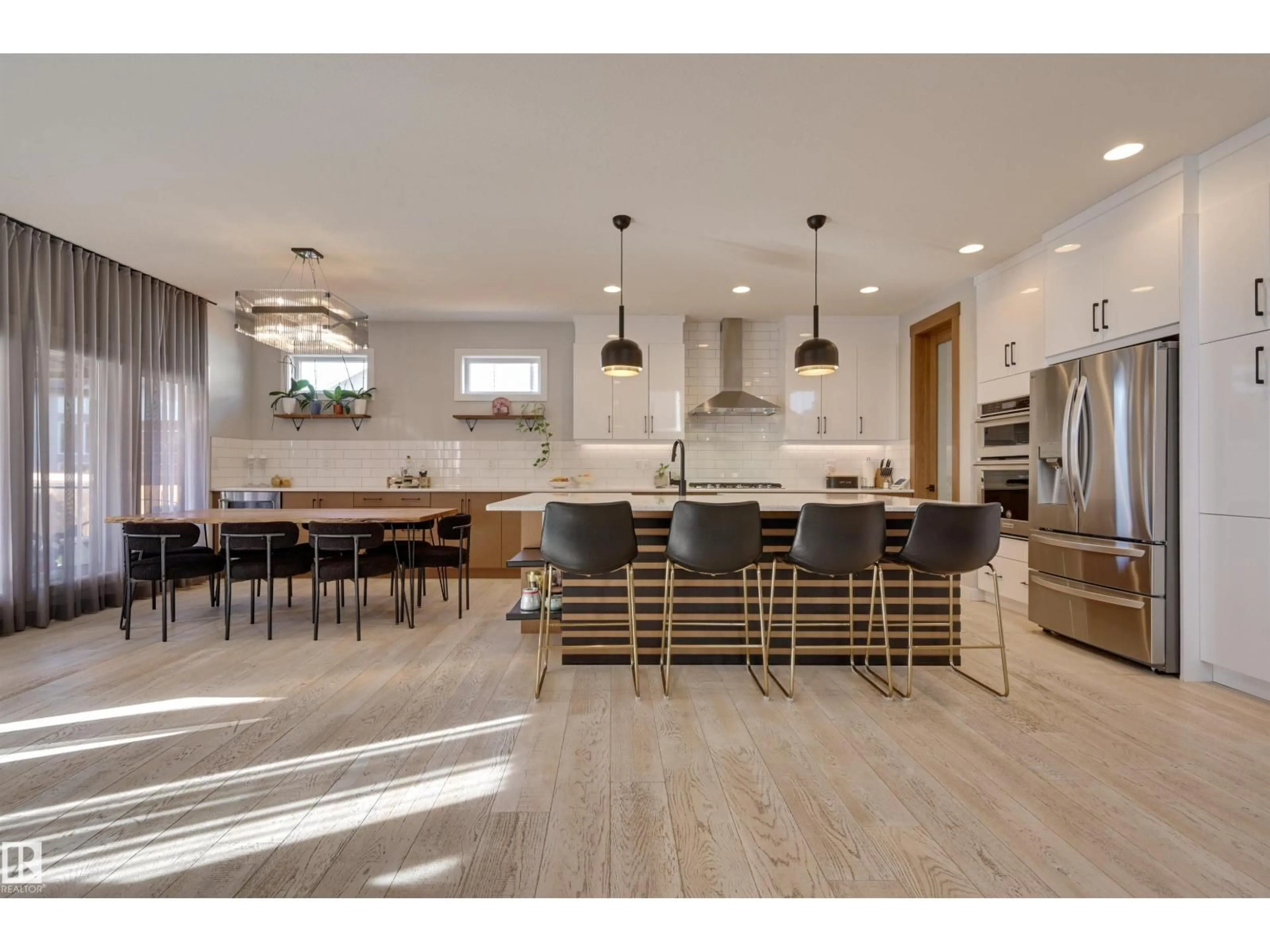 Open concept kitchen, wood/laminate floor for 550 EAGLESON WD, Edmonton Alberta T6M0Y4