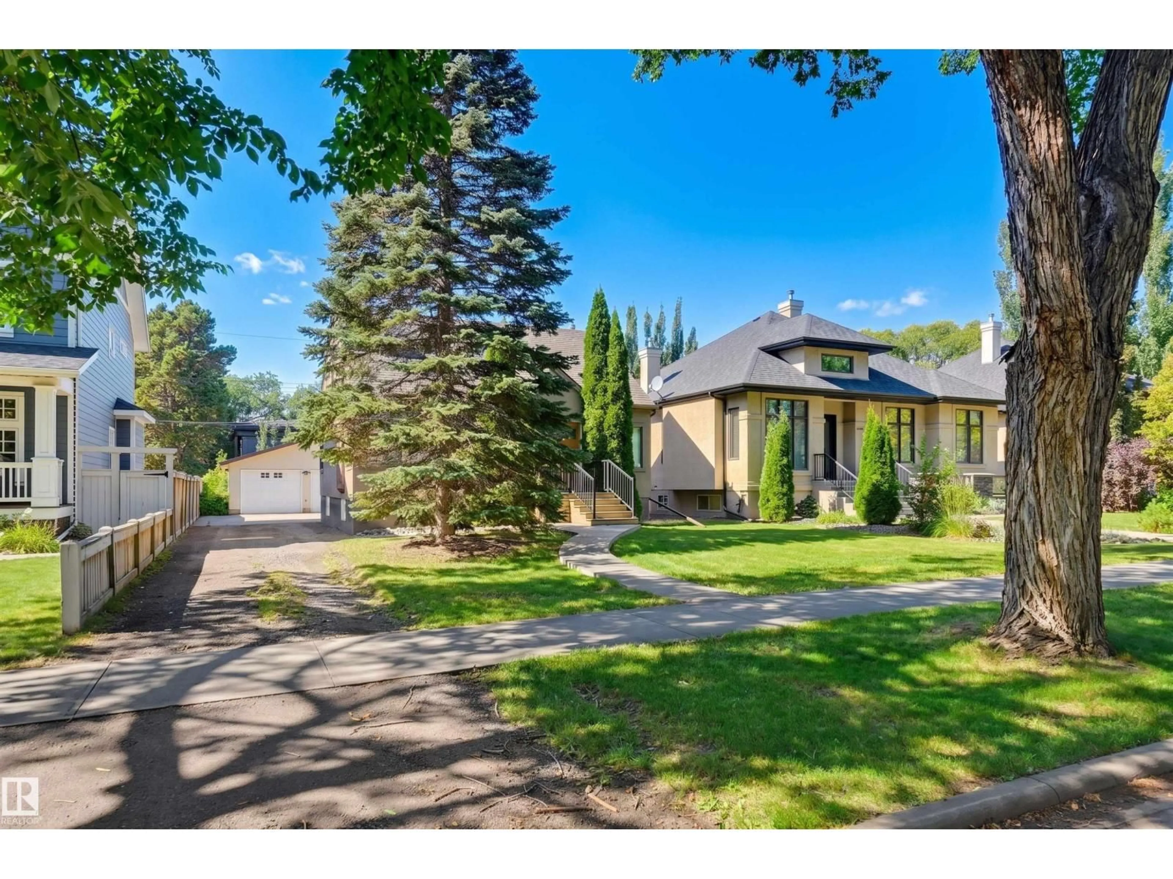 A pic from outside/outdoor area/front of a property/back of a property/a pic from drone, street for NW - 10318 138 ST, Edmonton Alberta T5N2J3