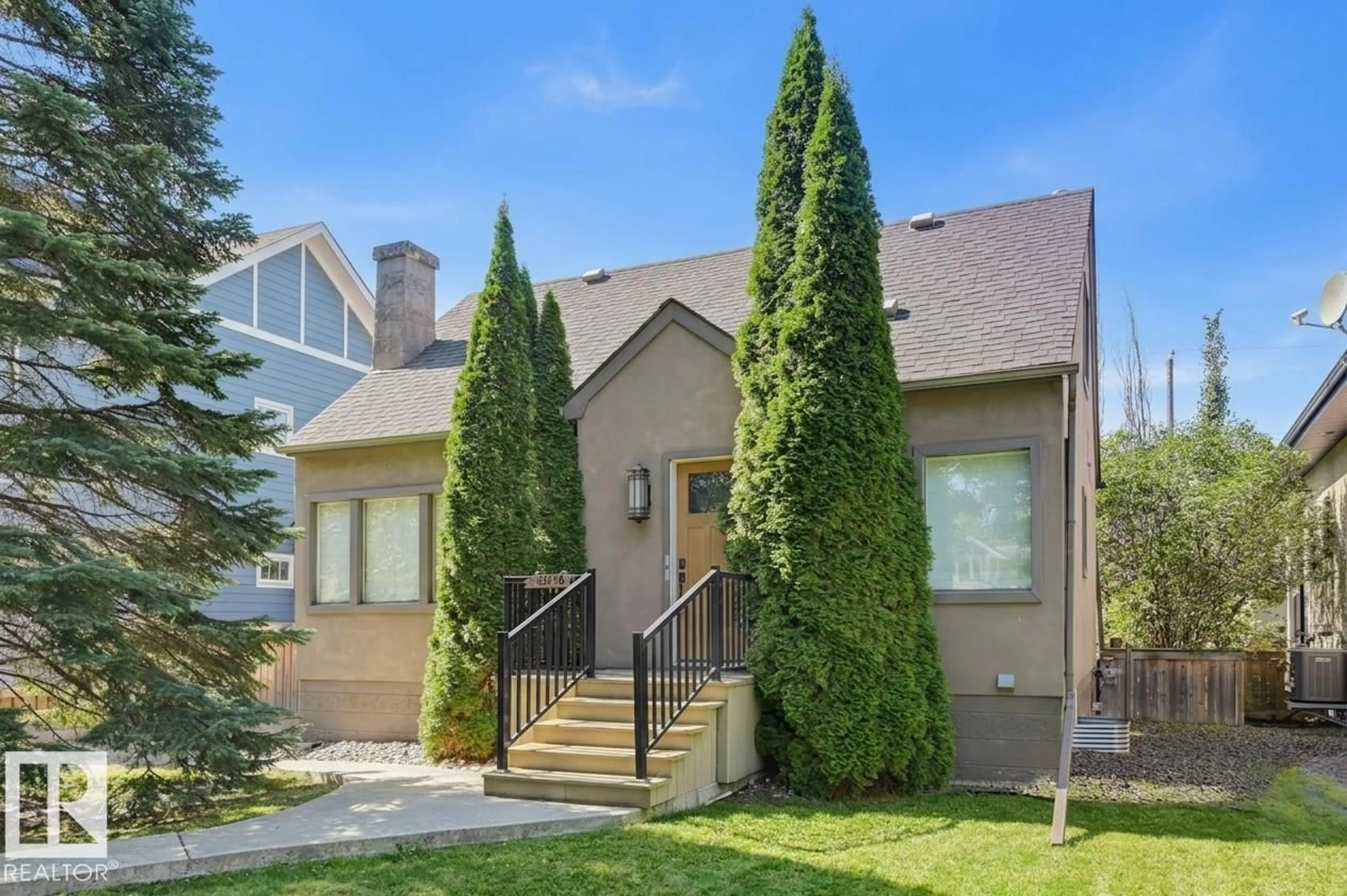 Home with brick exterior material, street for NW - 10318 138 ST, Edmonton Alberta T5N2J3