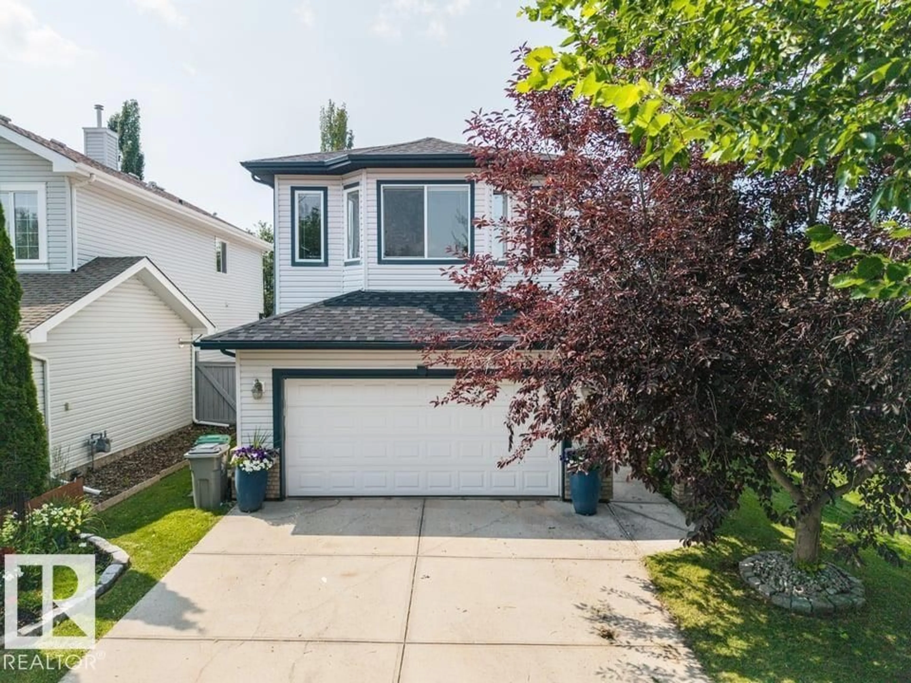 Home with vinyl exterior material, street for 22 BONIN, Beaumont Alberta T4X1S1
