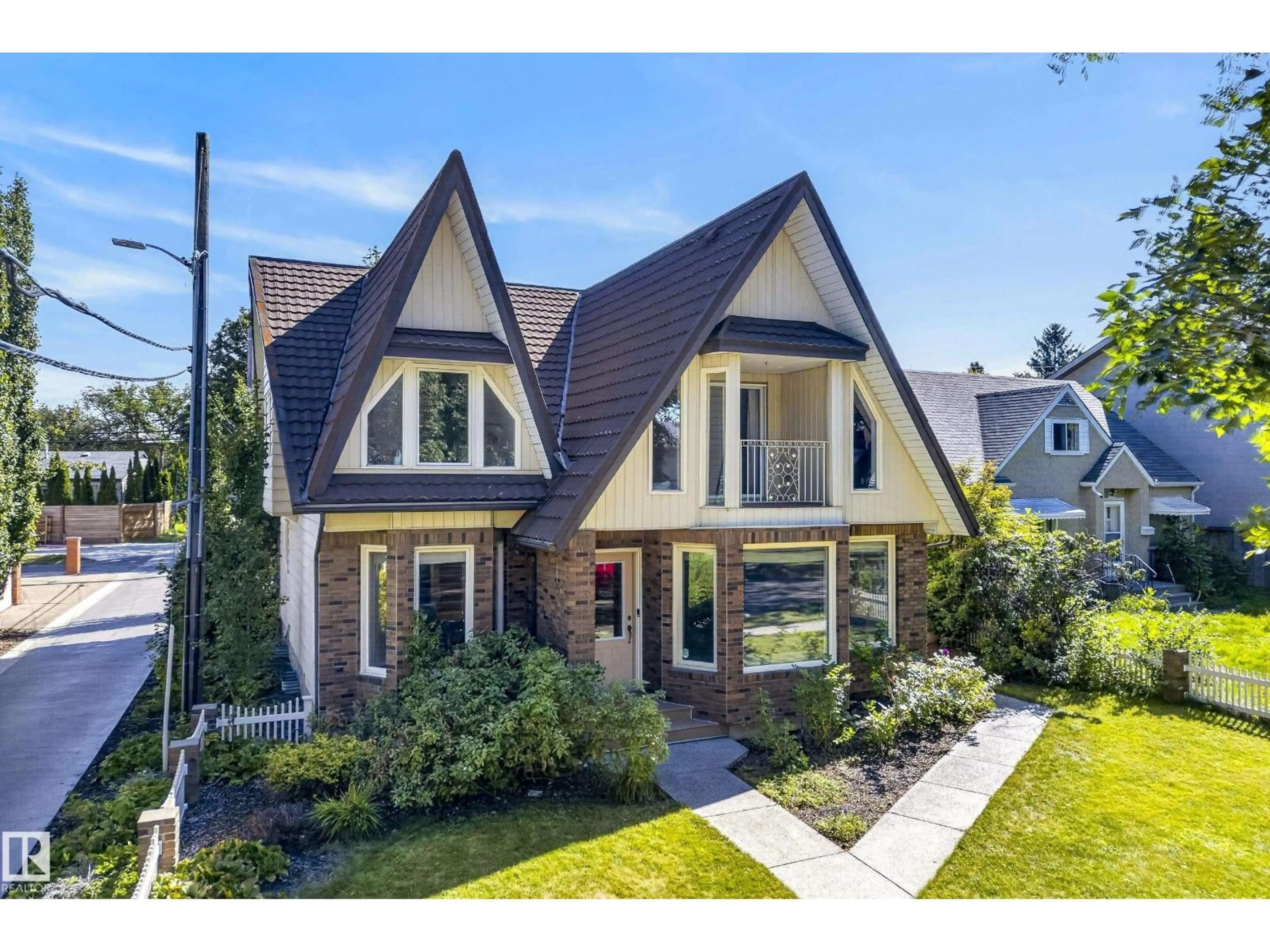 Home with brick exterior material, street for 9571 91 ST, Edmonton Alberta T6C3P6
