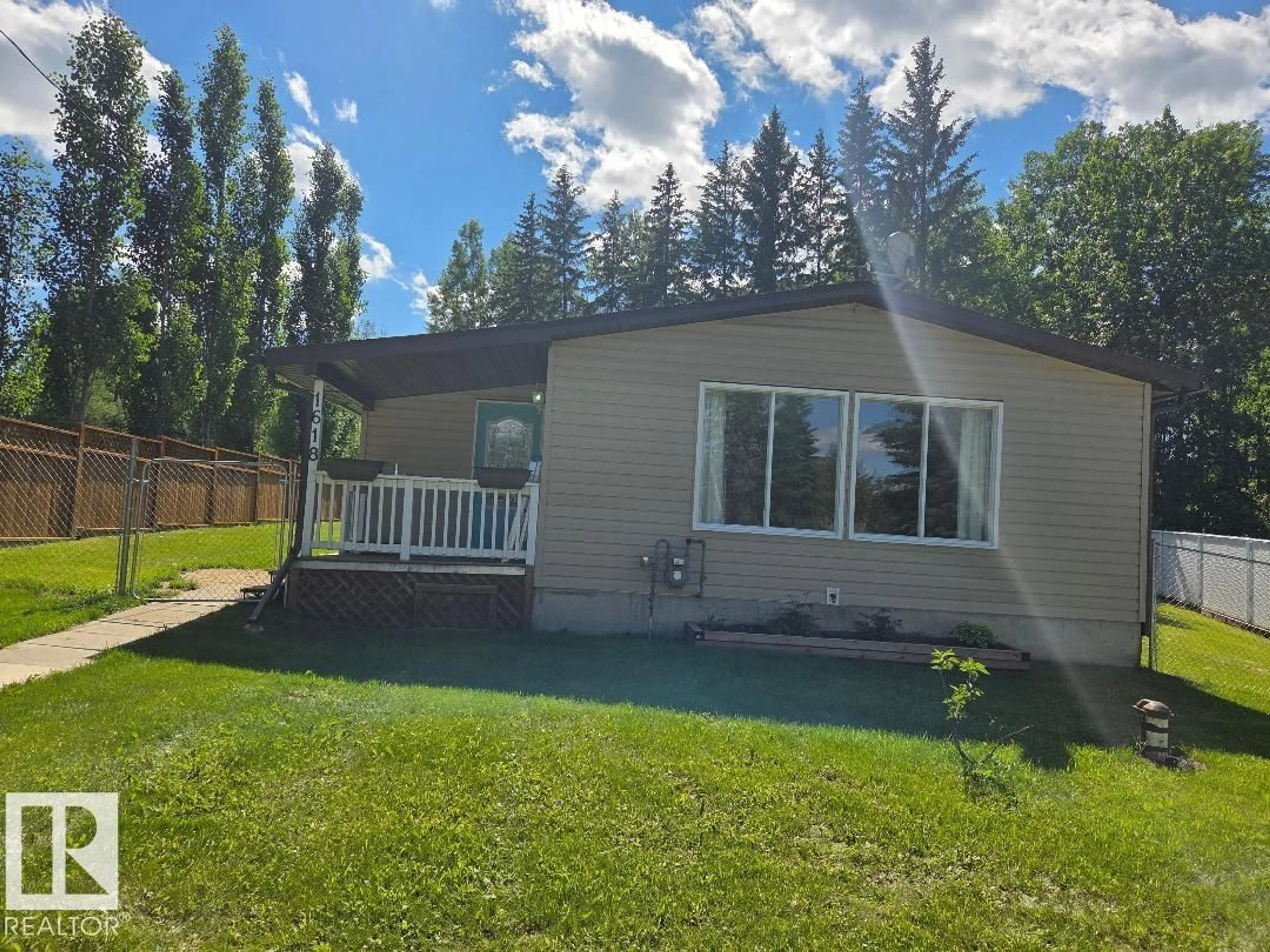 A pic from outside/outdoor area/front of a property/back of a property/a pic from drone, water/lake/river/ocean view for 1618 MARINE CR, Rural Lac Ste. Anne County Alberta T0E0A2