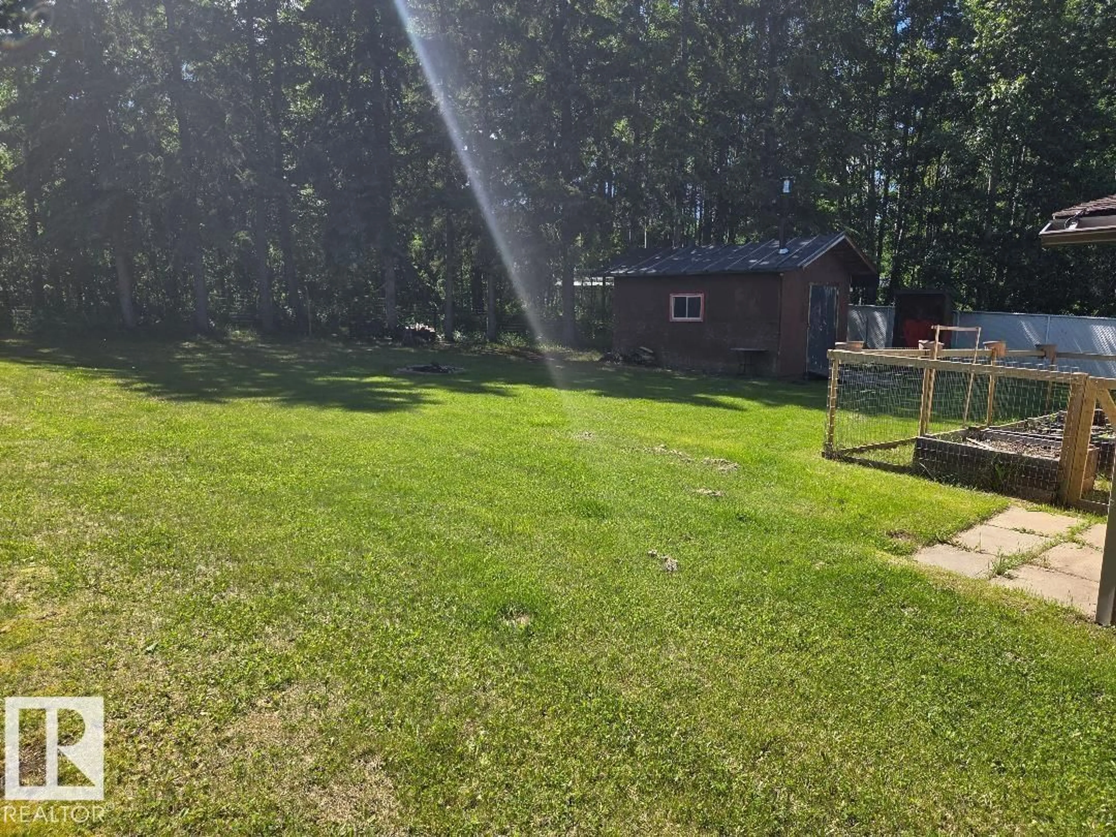 A pic from outside/outdoor area/front of a property/back of a property/a pic from drone, water/lake/river/ocean view for 1618 MARINE CR, Rural Lac Ste. Anne County Alberta T0E0A2