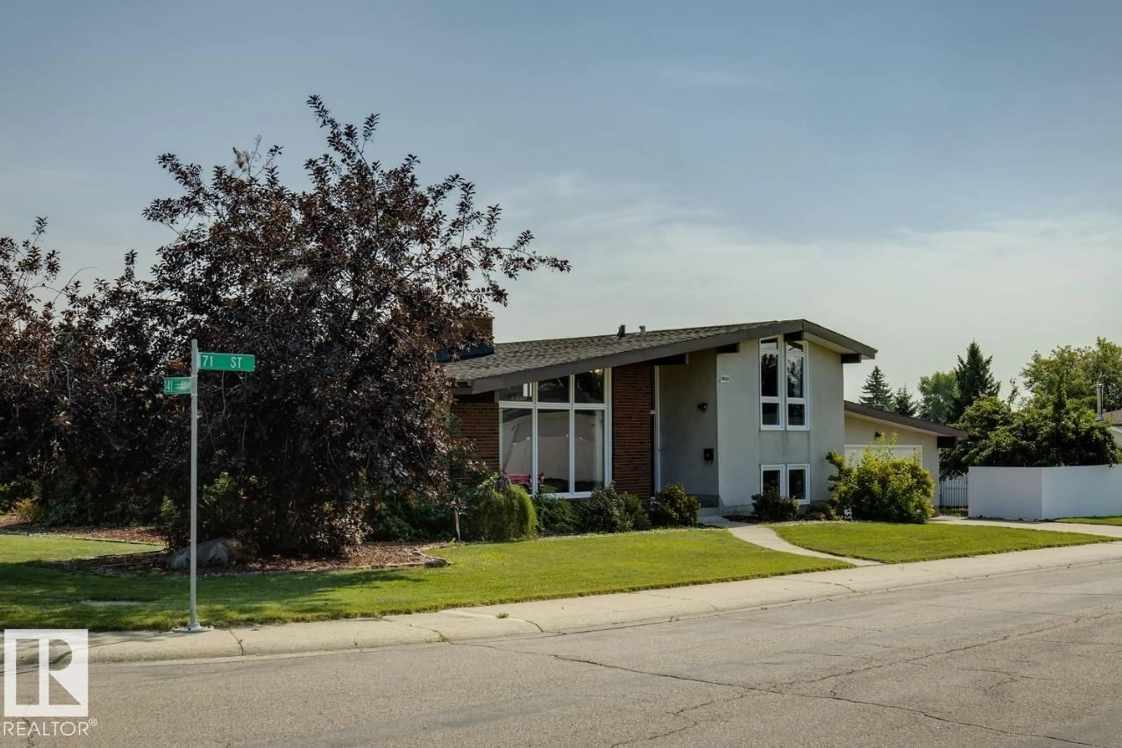 Home with vinyl exterior material, street for 14011 71 ST, Edmonton Alberta T5C0N3