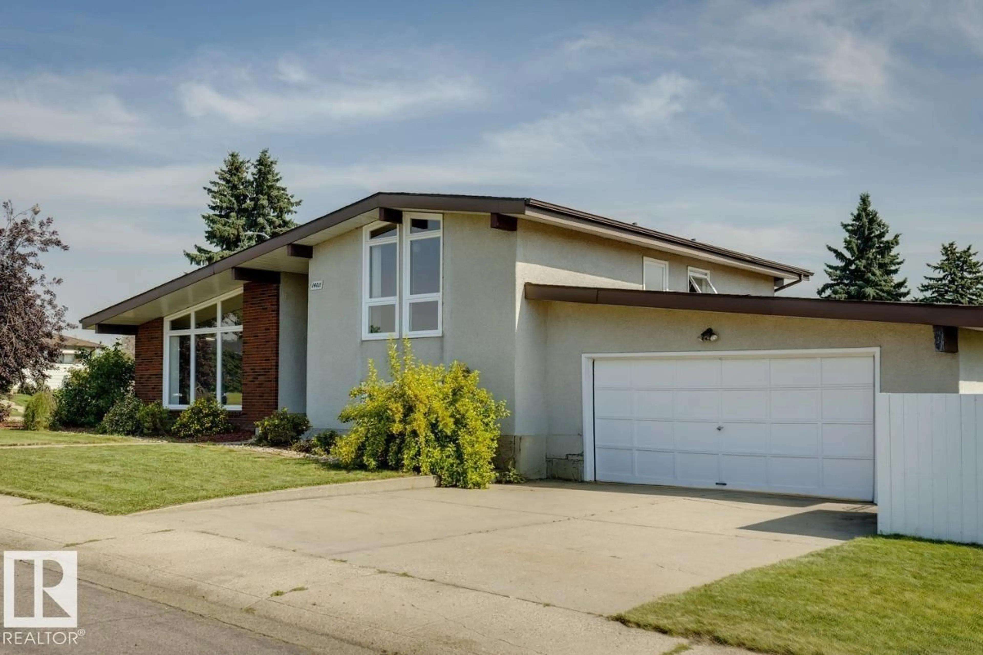 Home with vinyl exterior material, street for 14011 71 ST, Edmonton Alberta T5C0N3