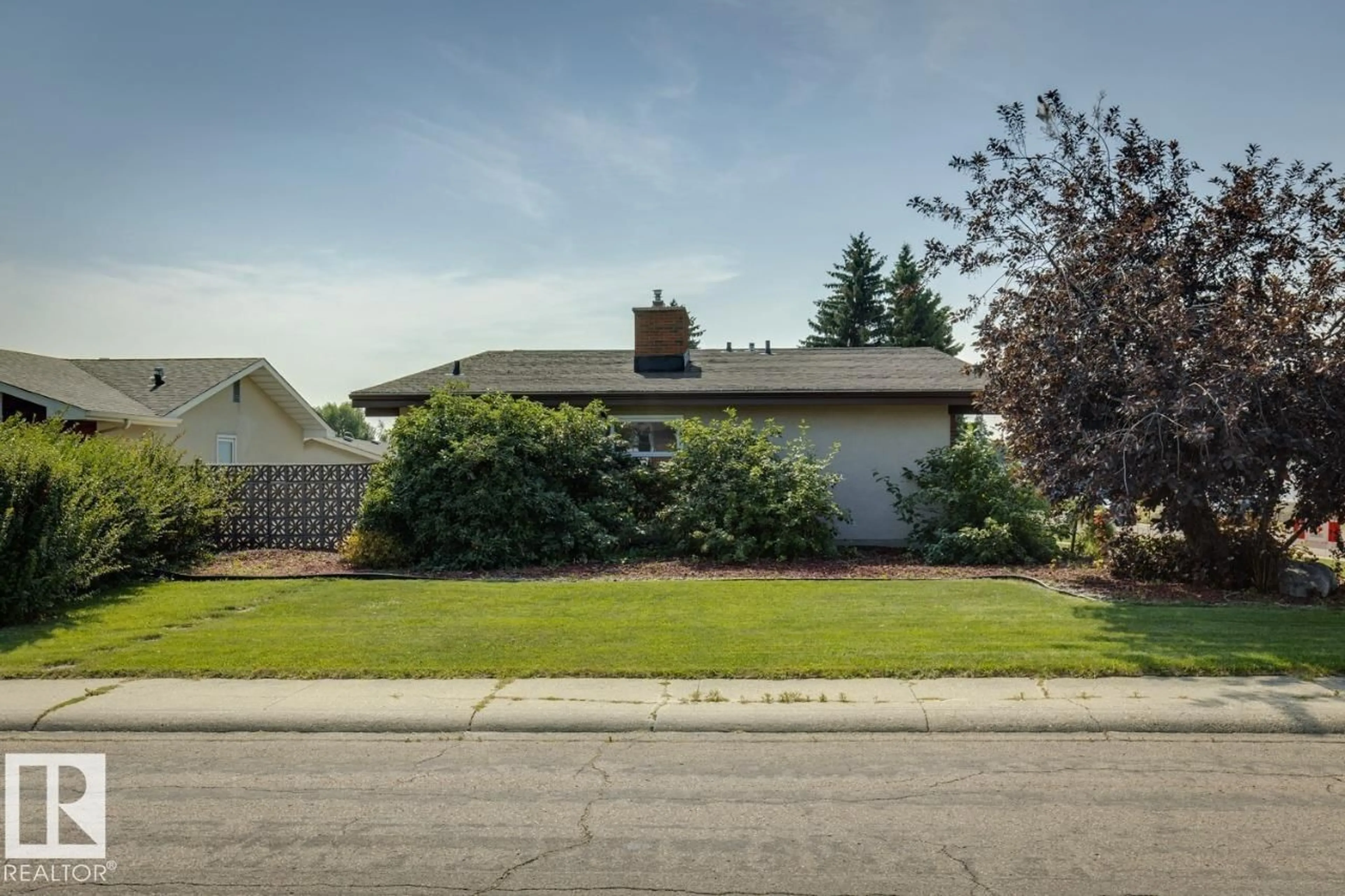 Home with vinyl exterior material, street for 14011 71 ST, Edmonton Alberta T5C0N3