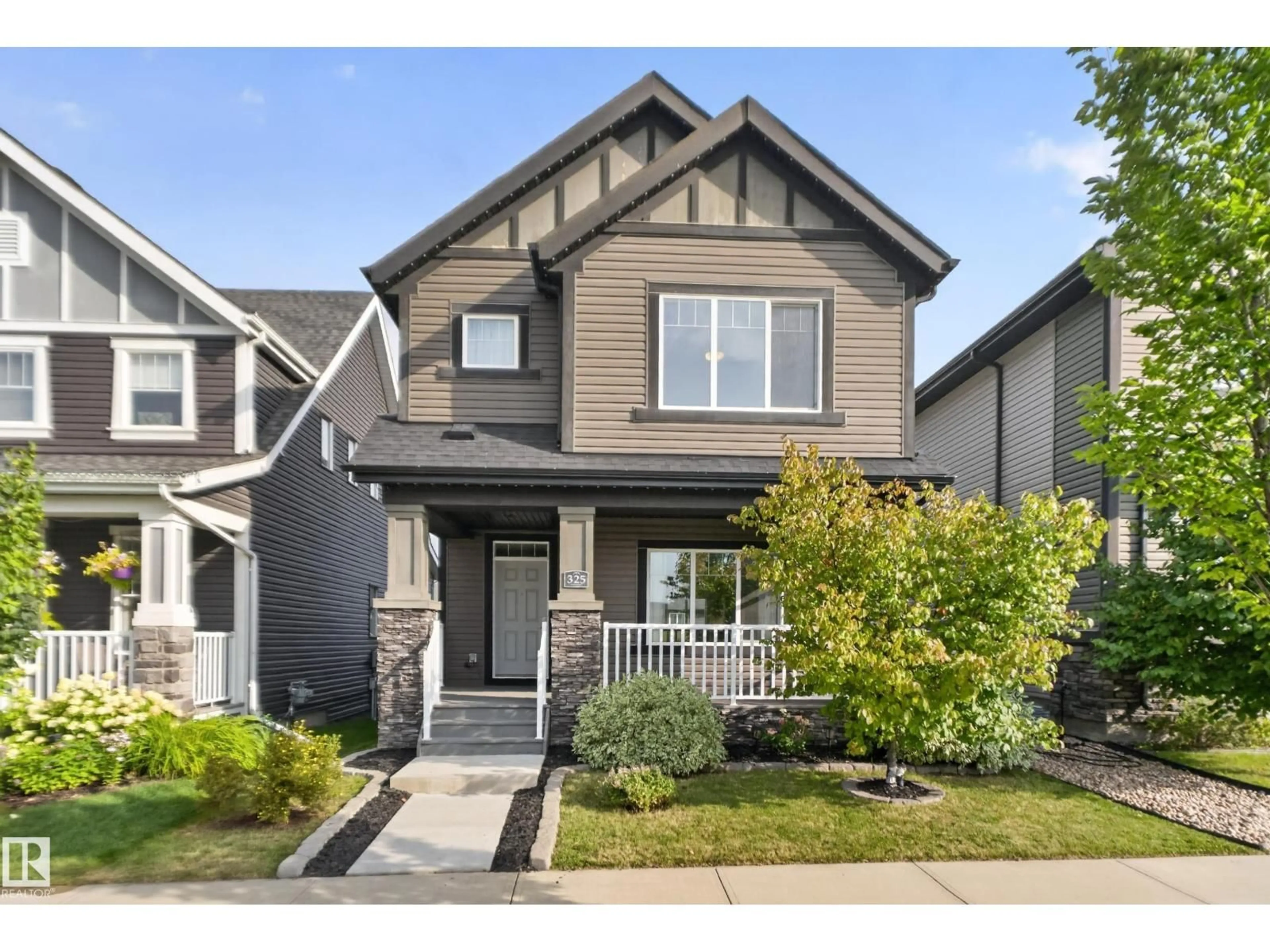 Home with vinyl exterior material, street for 325 HAWKS RIDGE BV, Edmonton Alberta T5S0M4