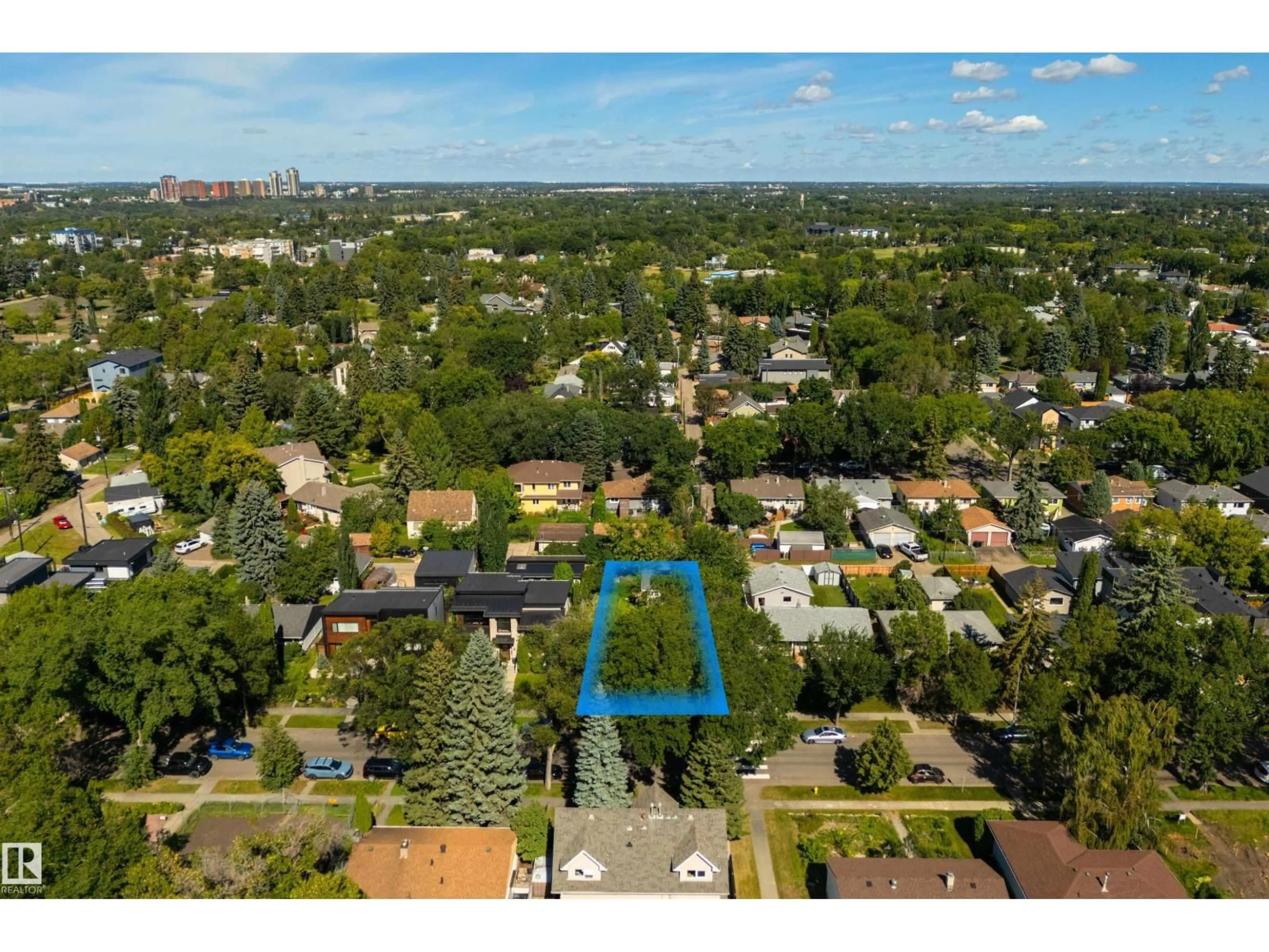 A pic from outside/outdoor area/front of a property/back of a property/a pic from drone, street for 7950 91 AV, Edmonton Alberta T6C1R1