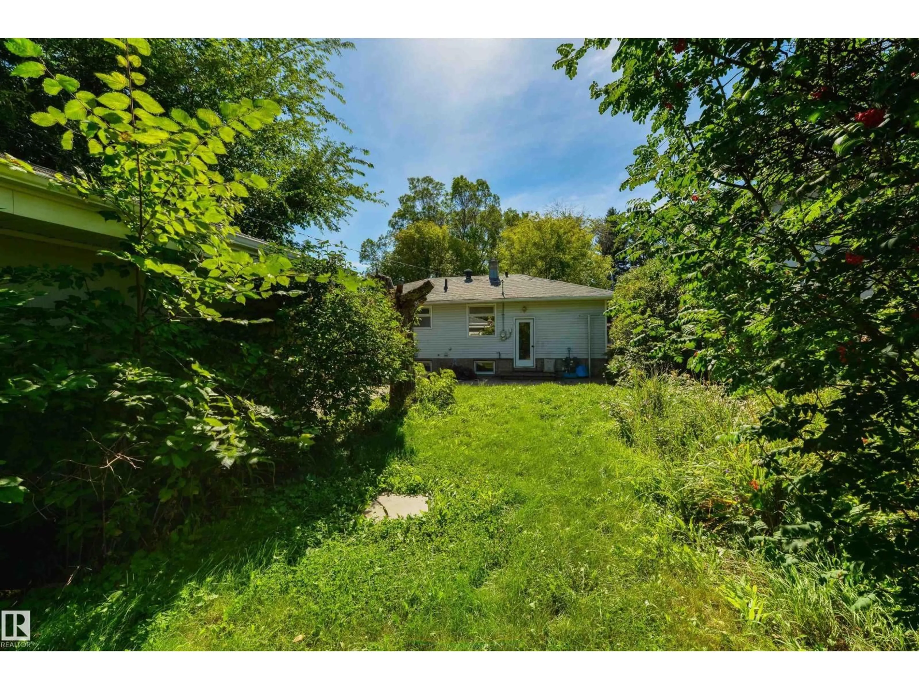A pic from outside/outdoor area/front of a property/back of a property/a pic from drone, unknown for 7950 91 AV, Edmonton Alberta T6C1R1