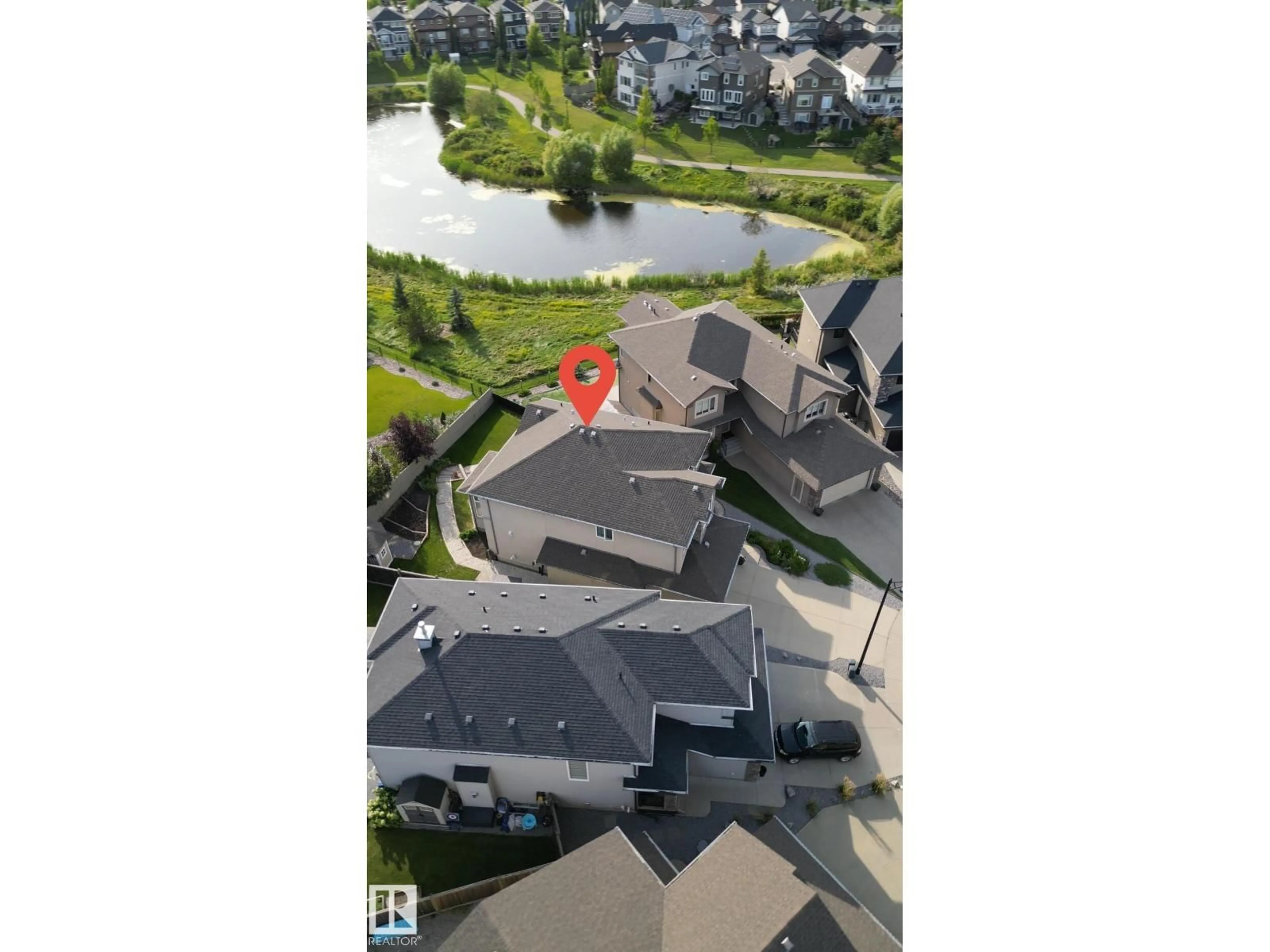 A pic from outside/outdoor area/front of a property/back of a property/a pic from drone, water/lake/river/ocean view for 914 CRYSTALLINA NERA WY, Edmonton Alberta T5Z0L1