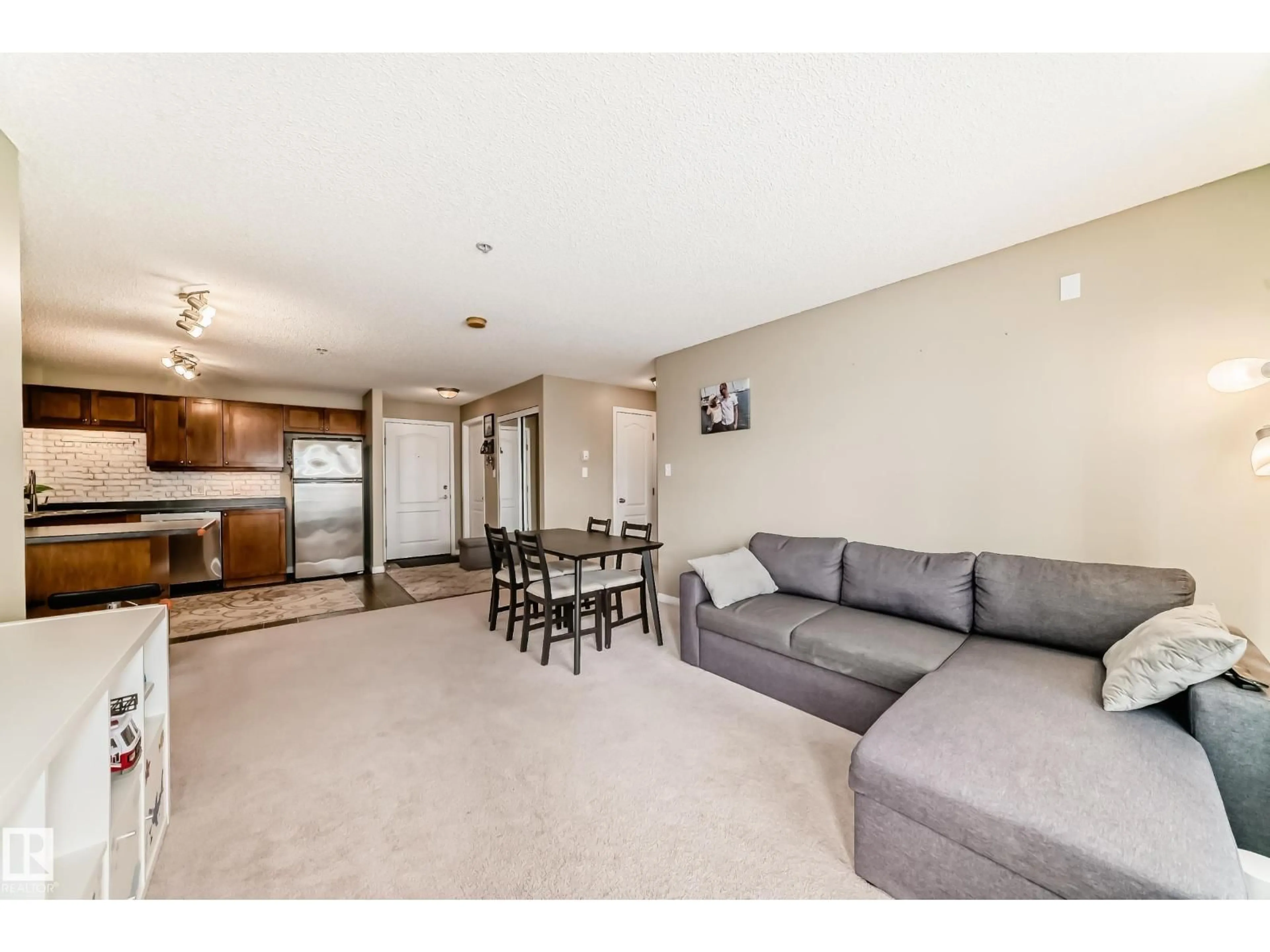 Living room with furniture, unknown for 1309 SOUTH TERWILLEGAR DR, Edmonton Alberta T6R0E1
