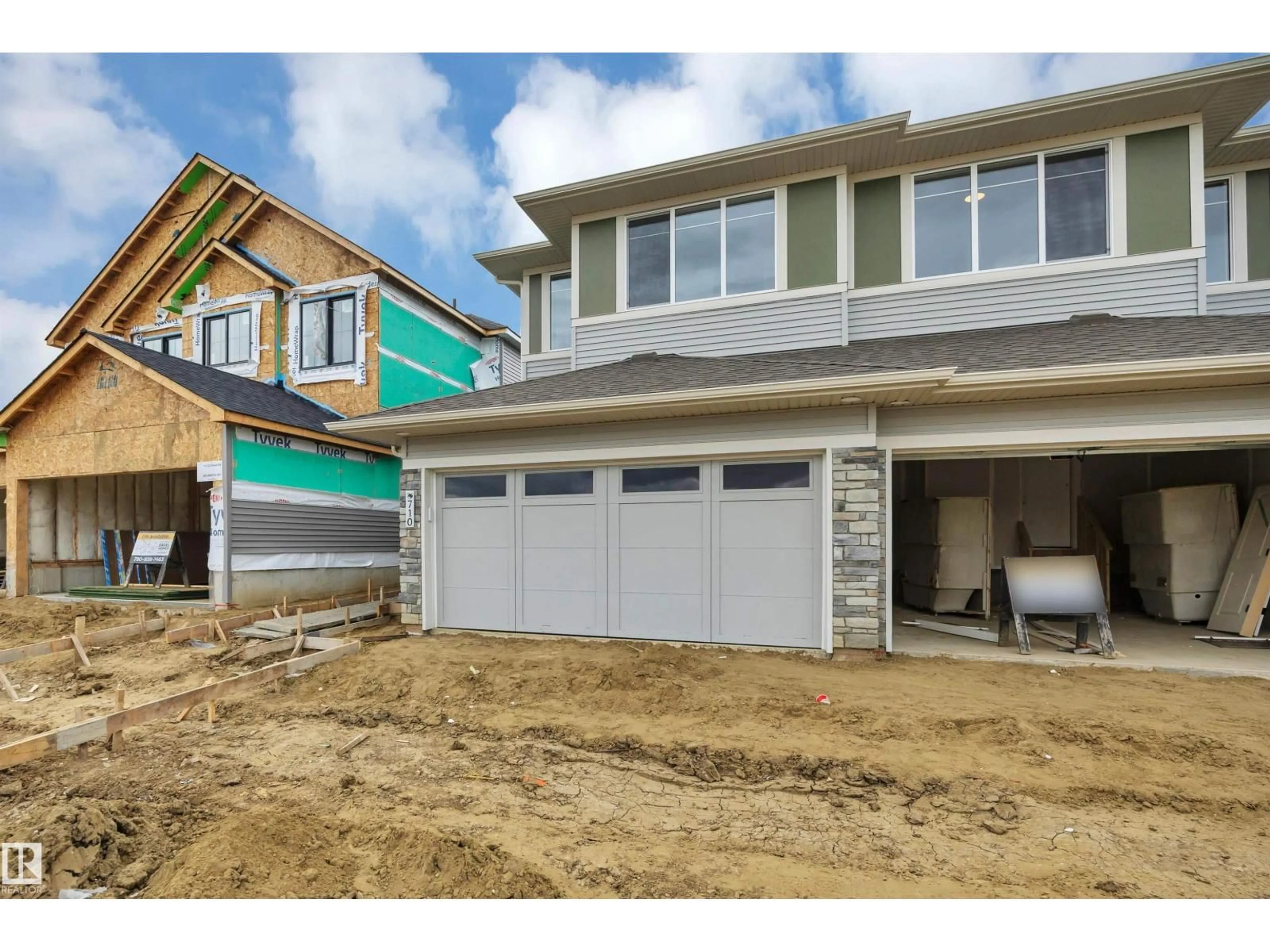 Home with vinyl exterior material, street for 710 22 ST, Edmonton Alberta T6X3M1