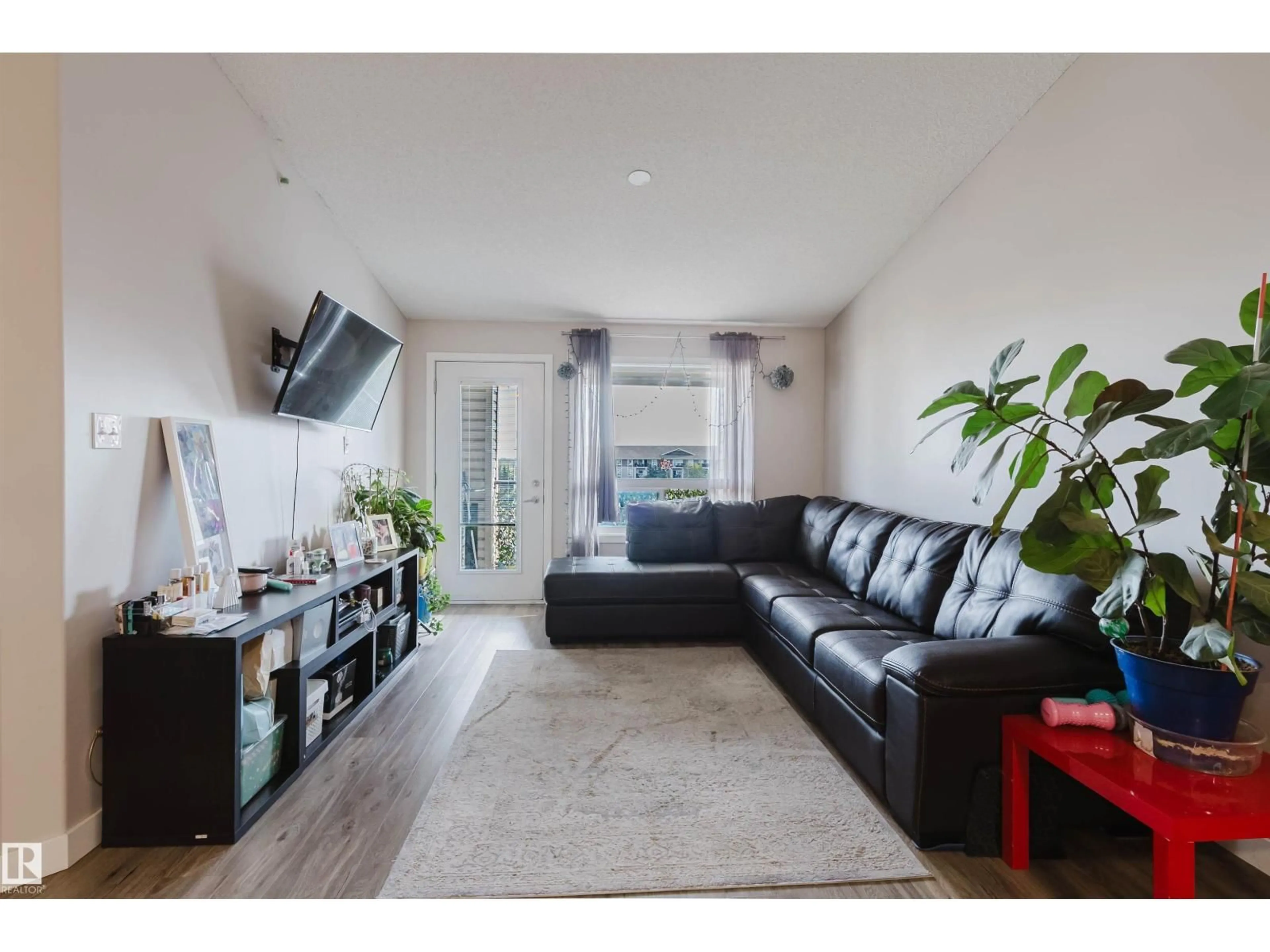 Living room with furniture, unknown for 7327 - 7428 SOUTH TERWILLEGAR DR, Edmonton Alberta T6R0L8