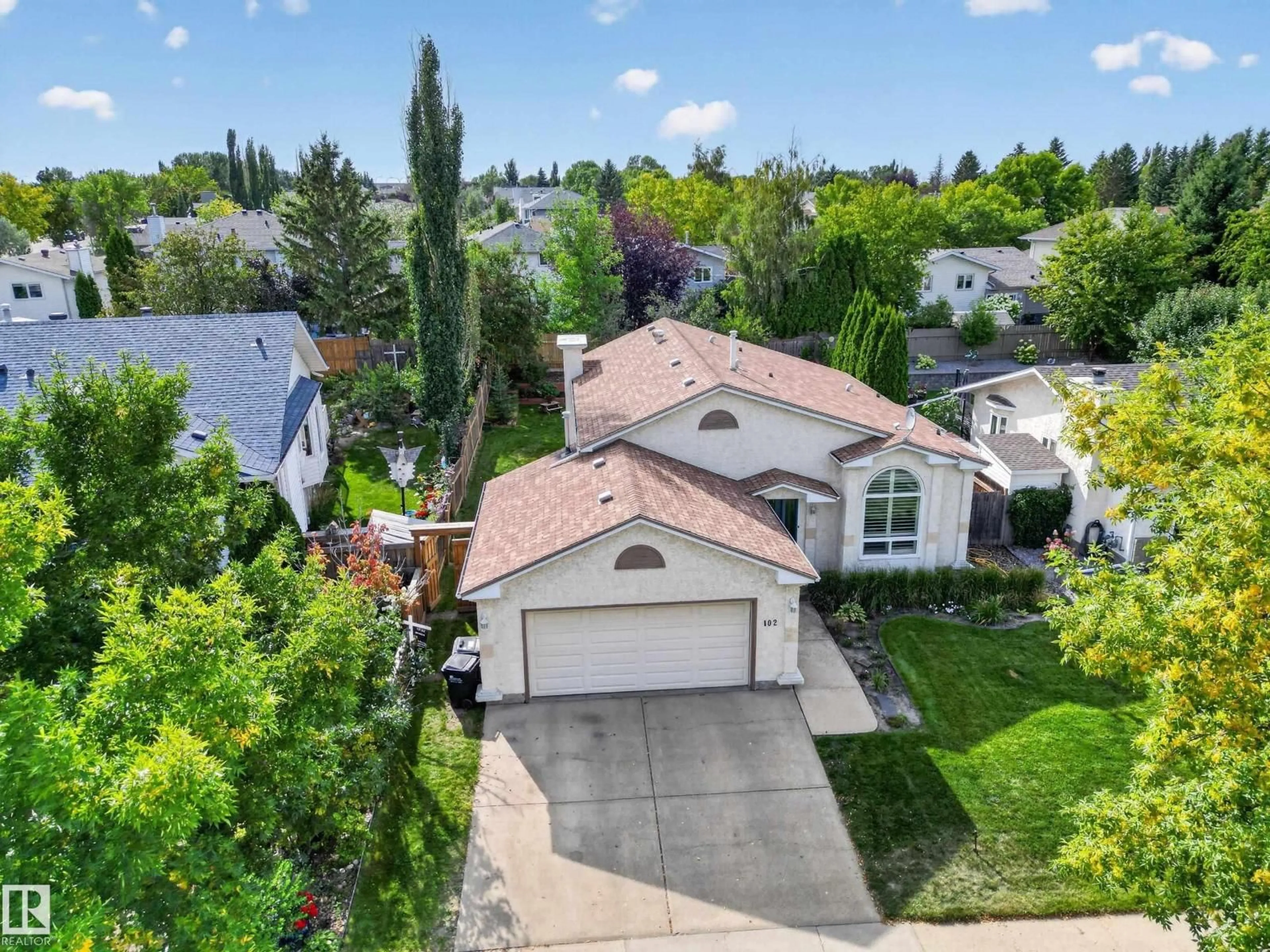 A pic from outside/outdoor area/front of a property/back of a property/a pic from drone, street for 102 COACHMAN WY, Sherwood Park Alberta T8H1M3
