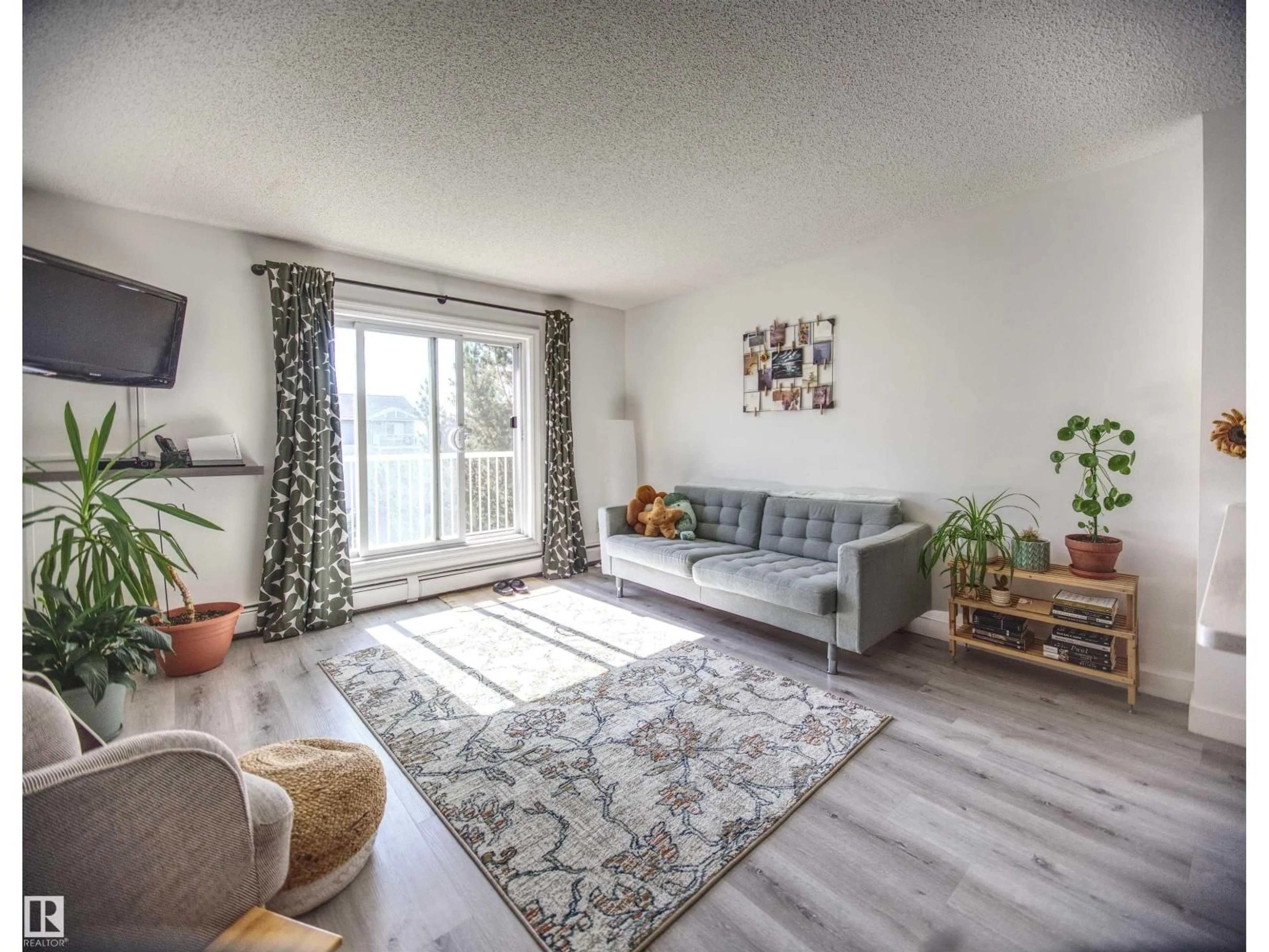 Living room with furniture, unknown for #409 - 4403 23 ST, Edmonton Alberta T6T0E4