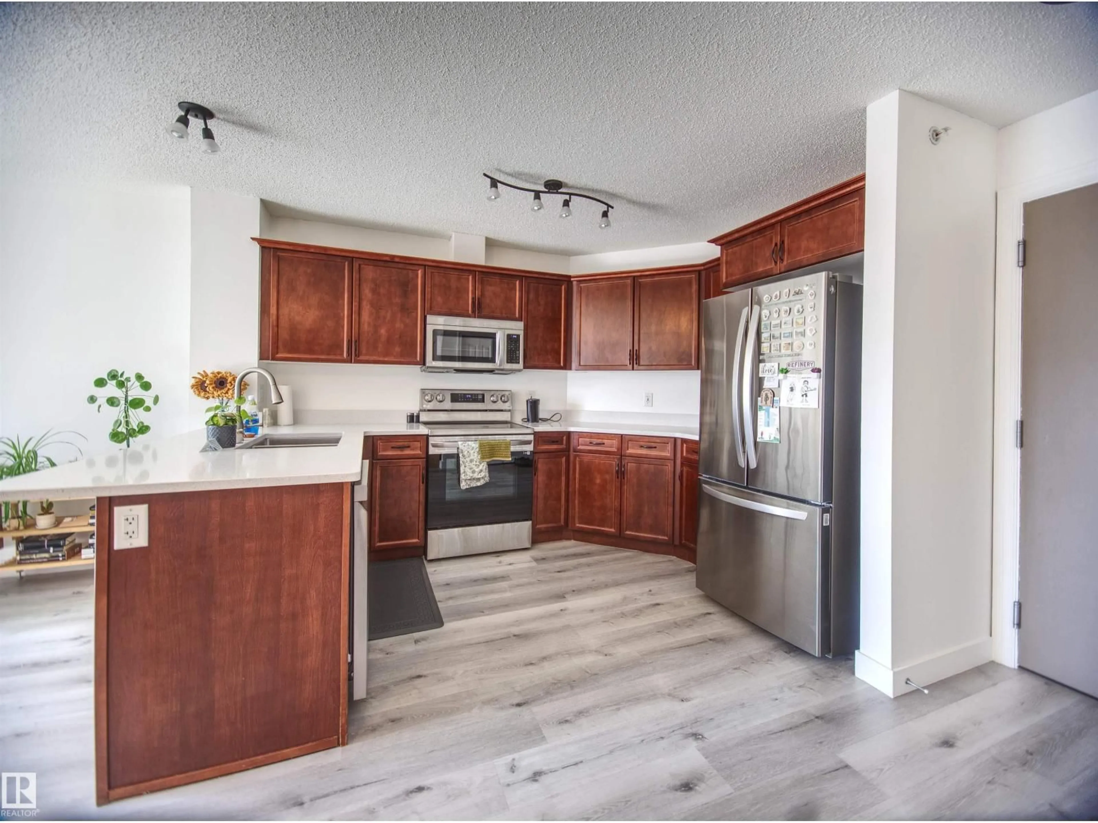 Open concept kitchen, unknown for #409 - 4403 23 ST, Edmonton Alberta T6T0E4