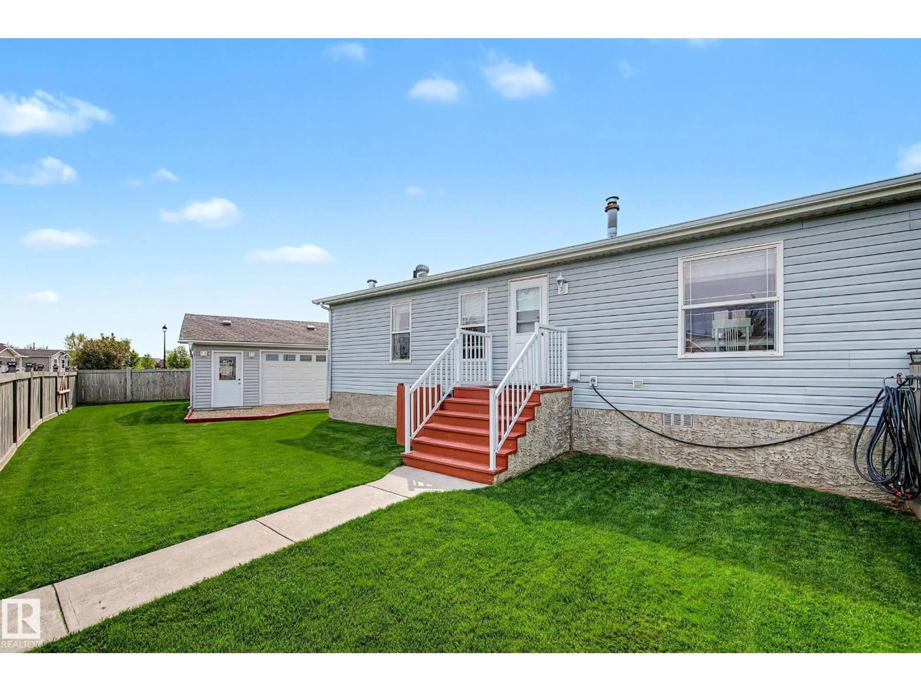 Home with vinyl exterior material, street for 3029 ASPEN WD, Leduc Alberta T9E8R1