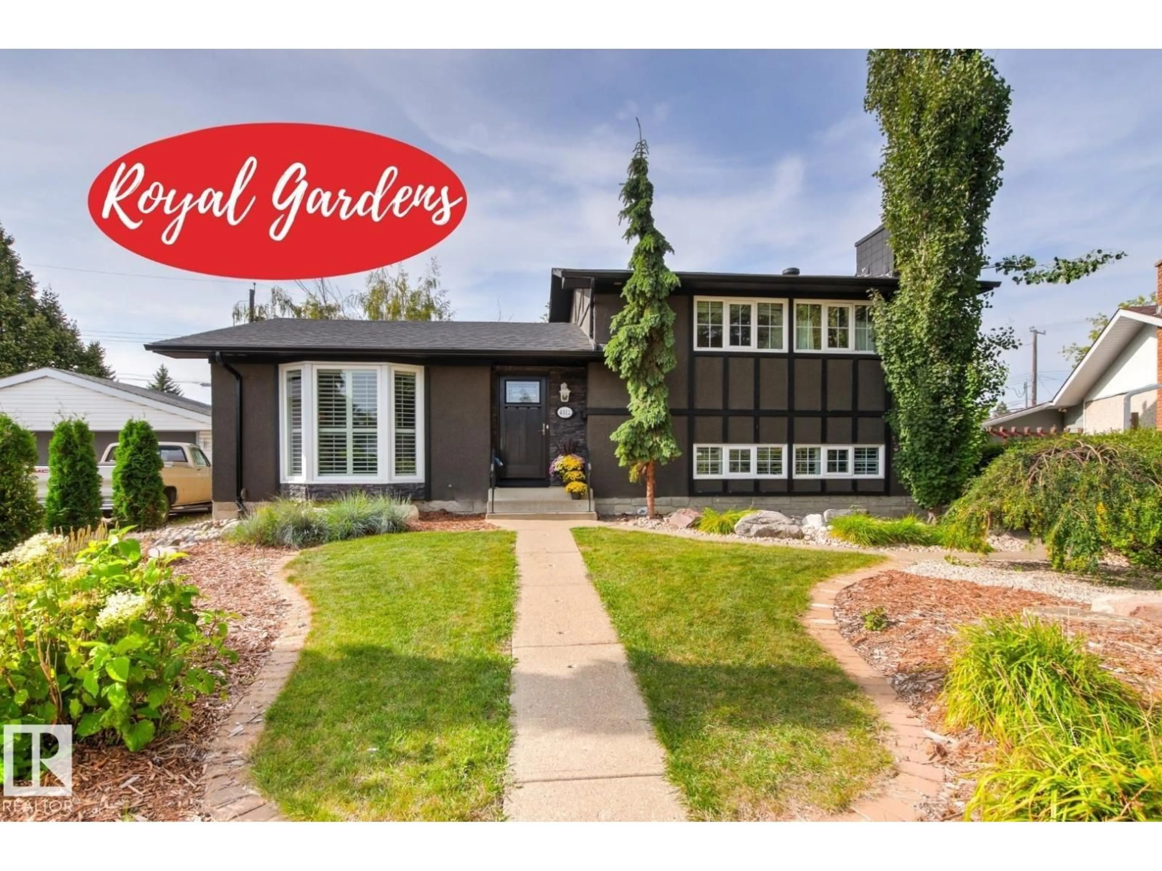 Home with vinyl exterior material, street for NW - 4112 111B ST, Edmonton Alberta T6J1H6