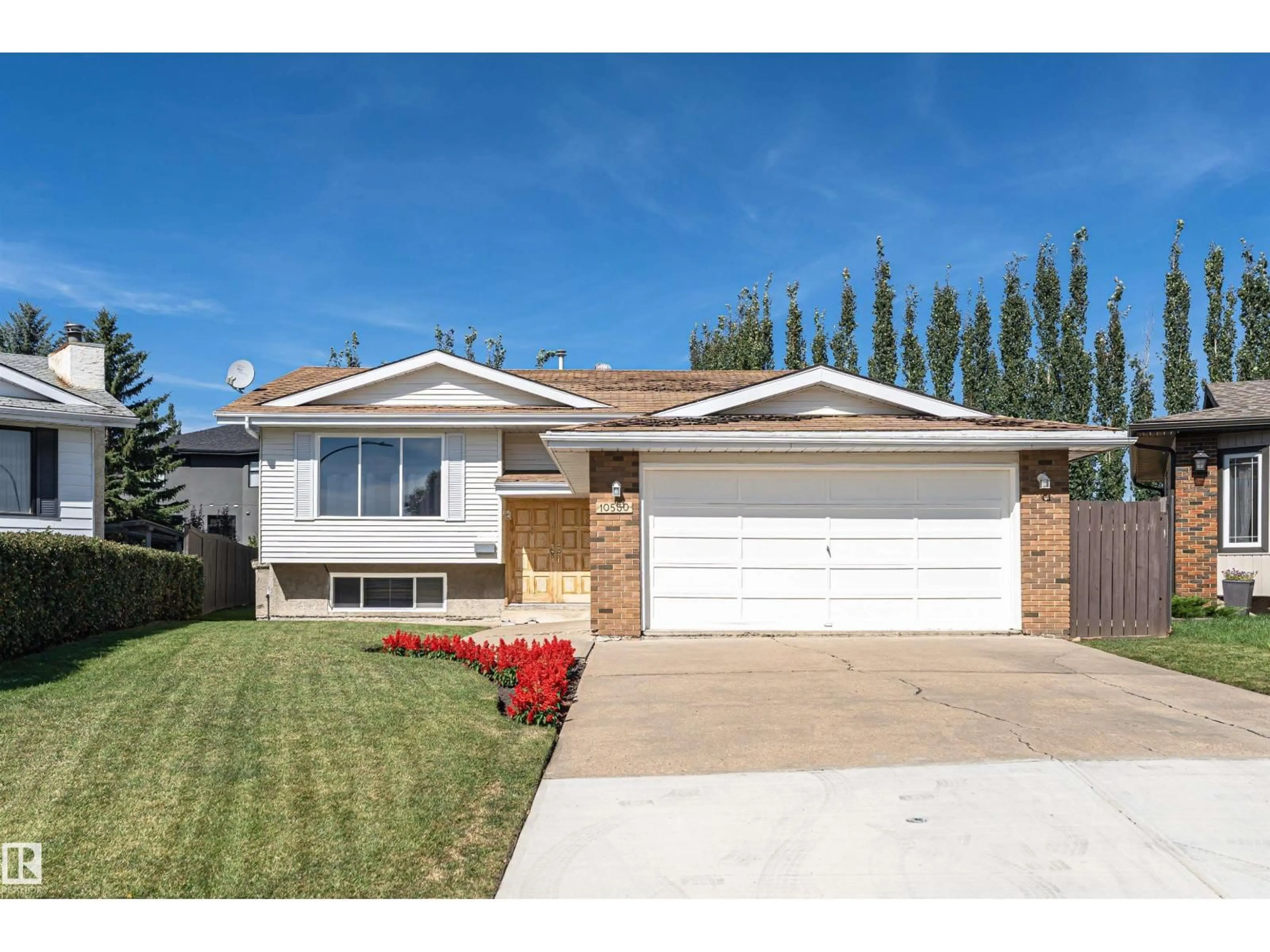 Home with vinyl exterior material, street for 10530 173A AV, Edmonton Alberta T5X3H2