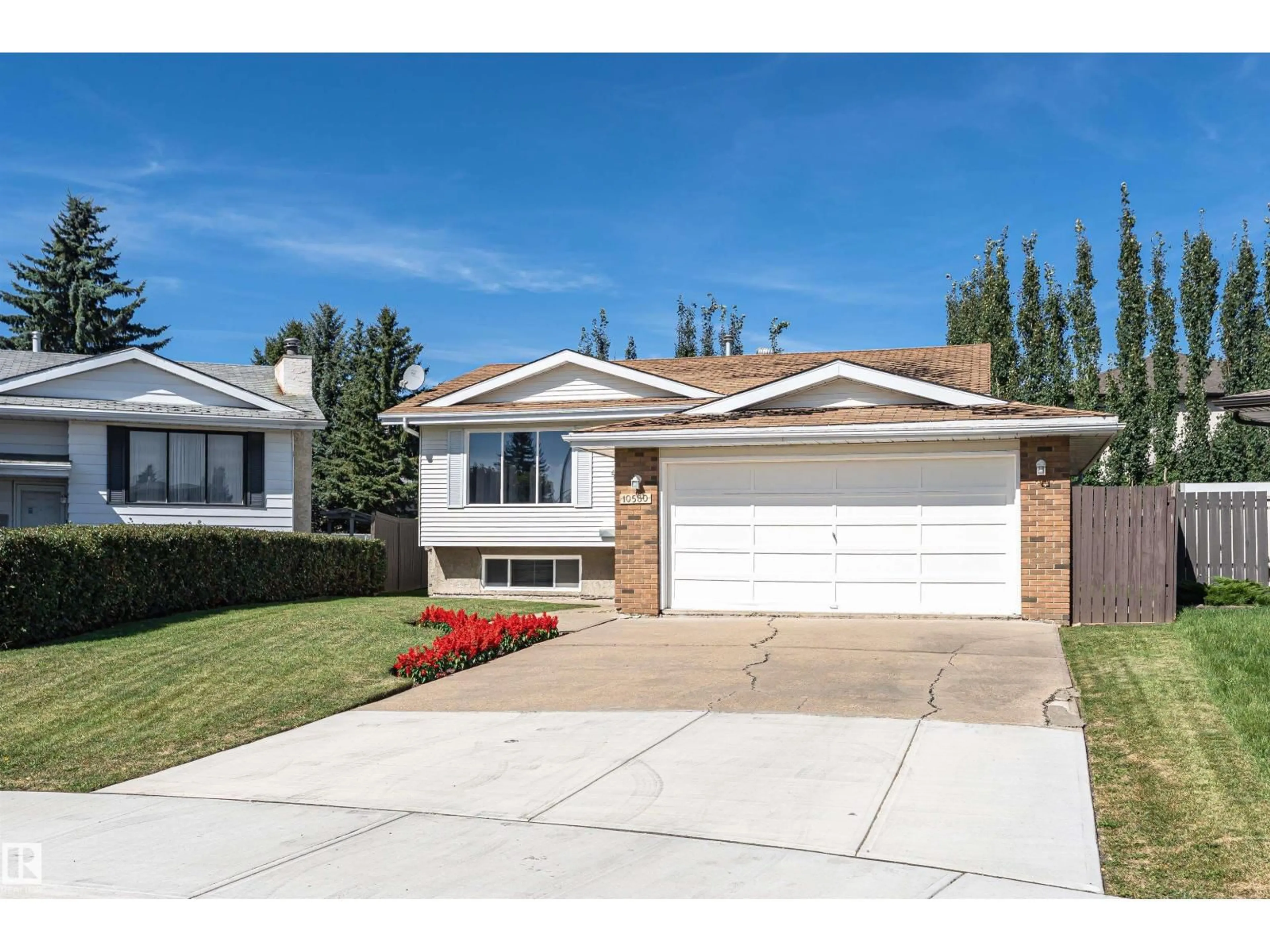 Home with vinyl exterior material, street for 10530 173A AV, Edmonton Alberta T5X3H2