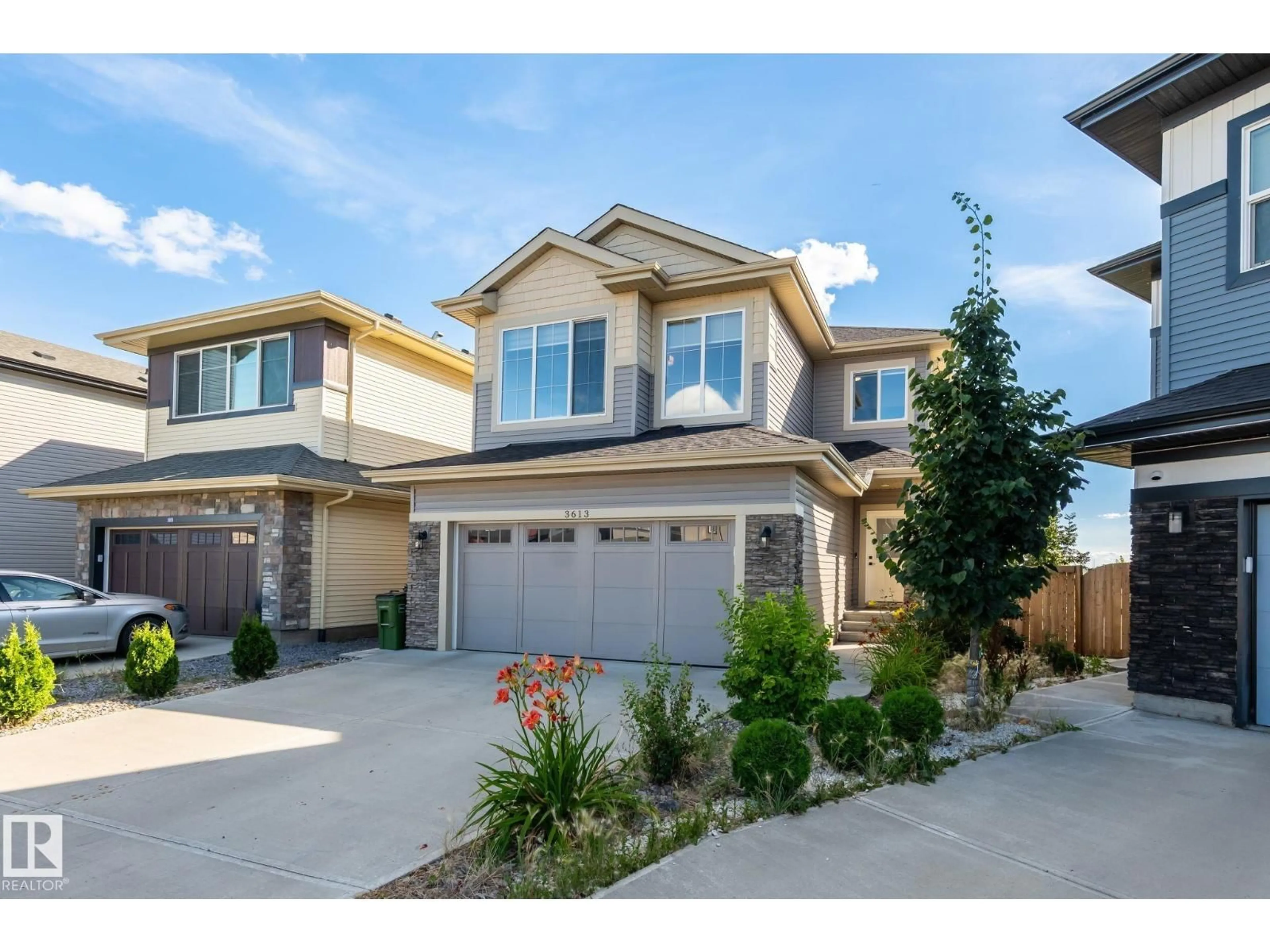 Home with vinyl exterior material, street for 3613 CHECKNITA COVE, Edmonton Alberta T6W4W7