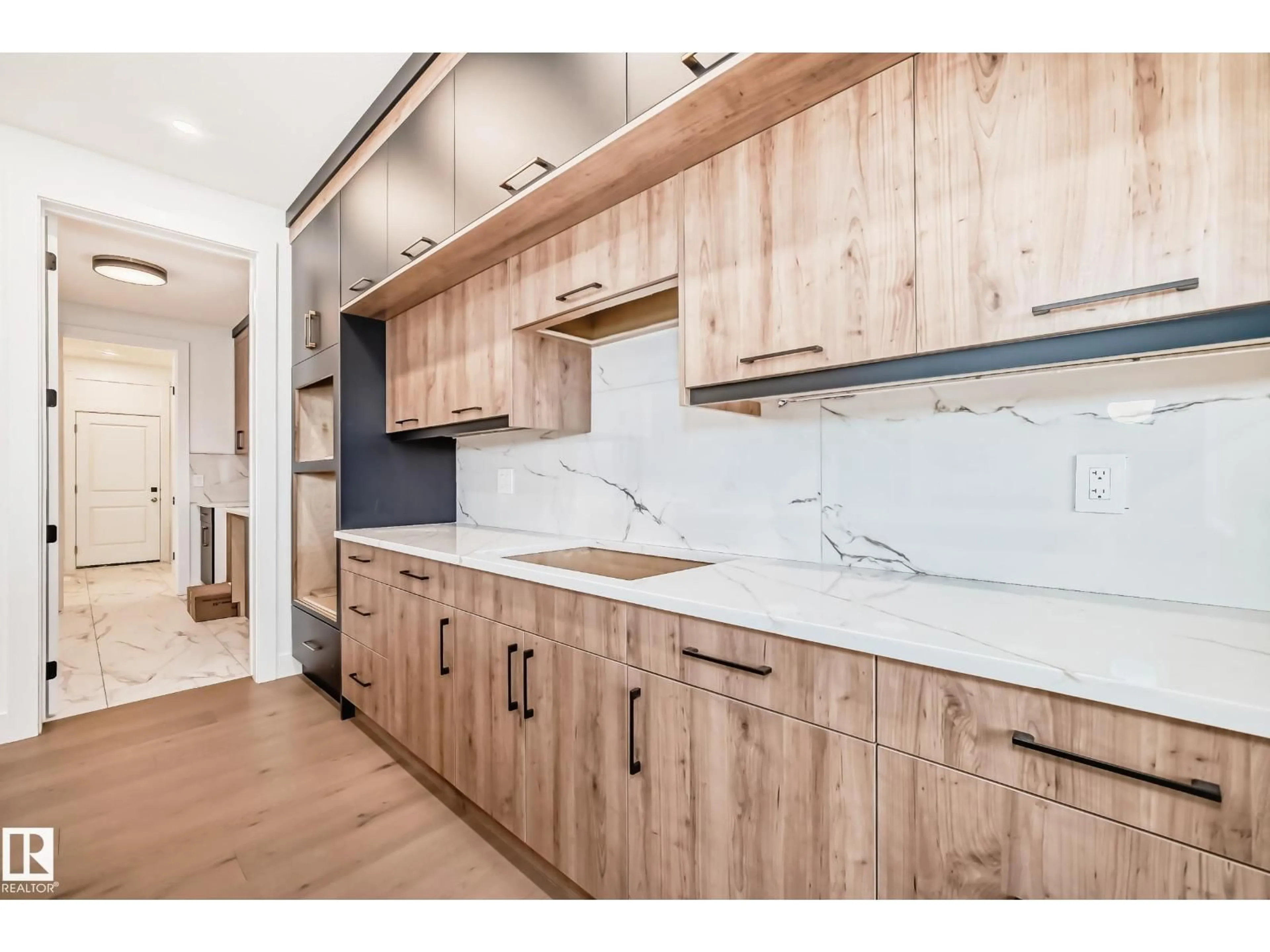 Open concept kitchen, wood/laminate floor for NW - 8418 223 A ST, Edmonton Alberta T5T7X2