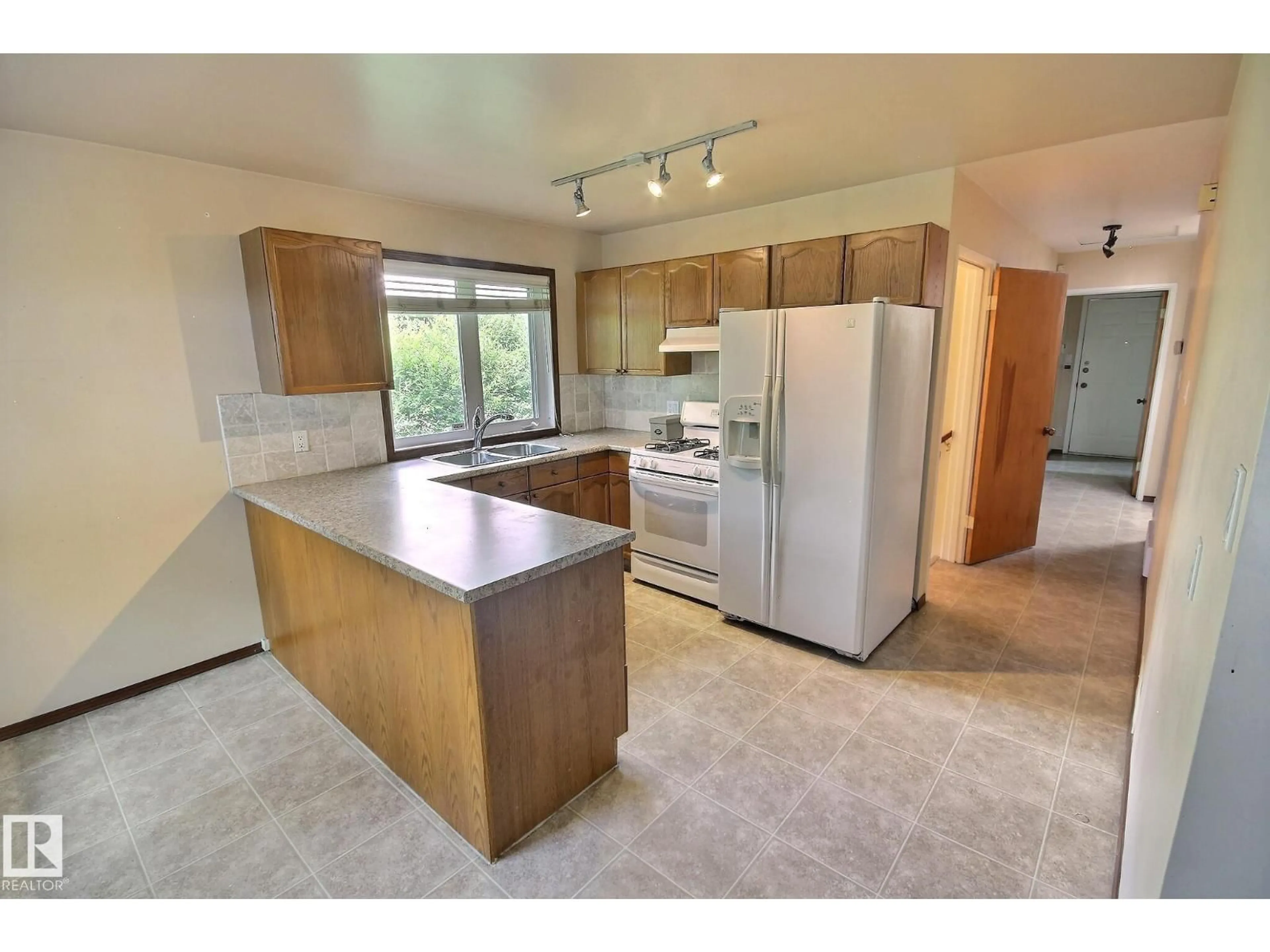 Open concept kitchen, unknown for 9457 79 ST, Edmonton Alberta T6C2R8