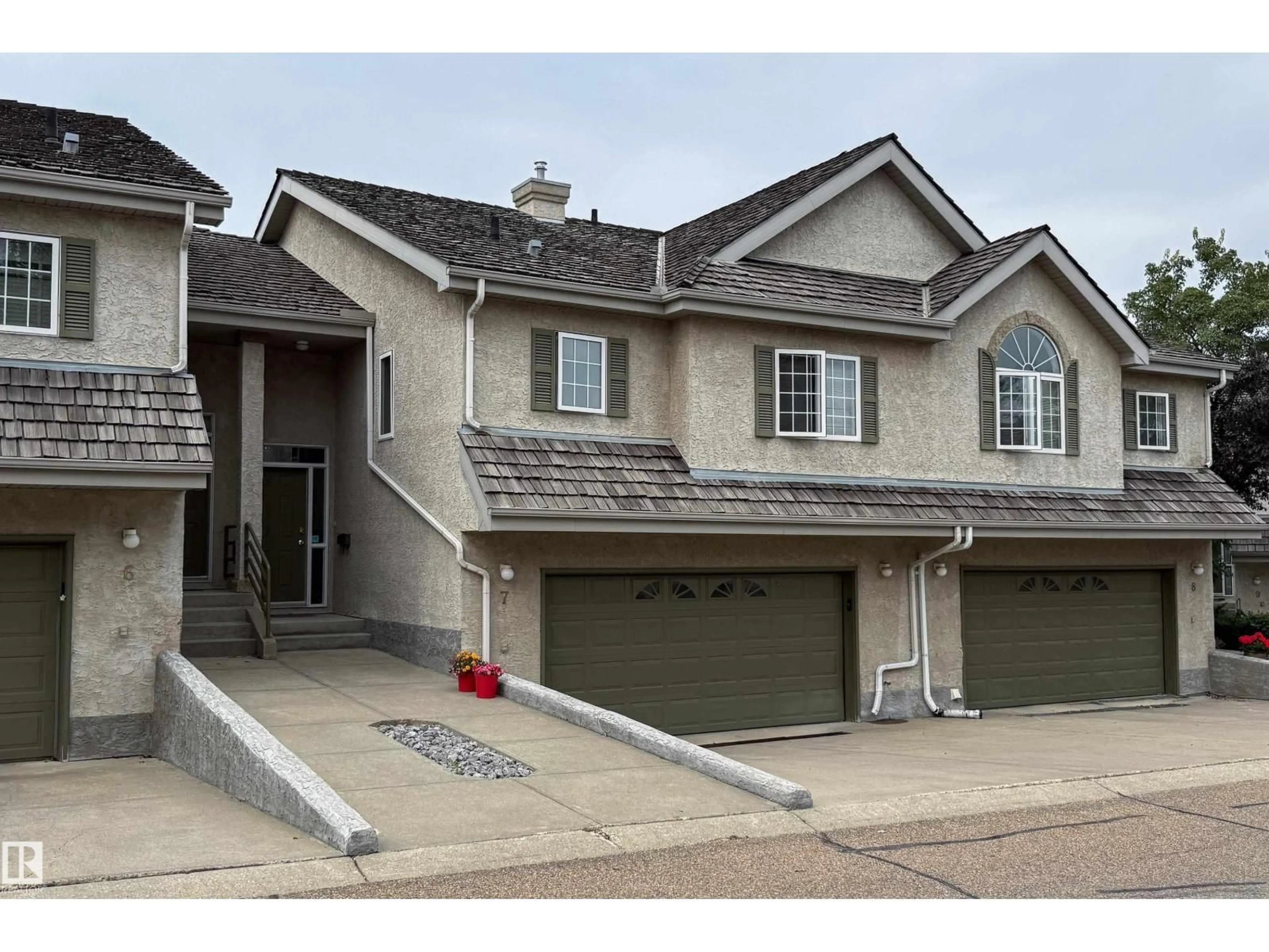 Home with vinyl exterior material, street for 7 - 1283 CARTER CREST RD, Edmonton Alberta T6R2N5