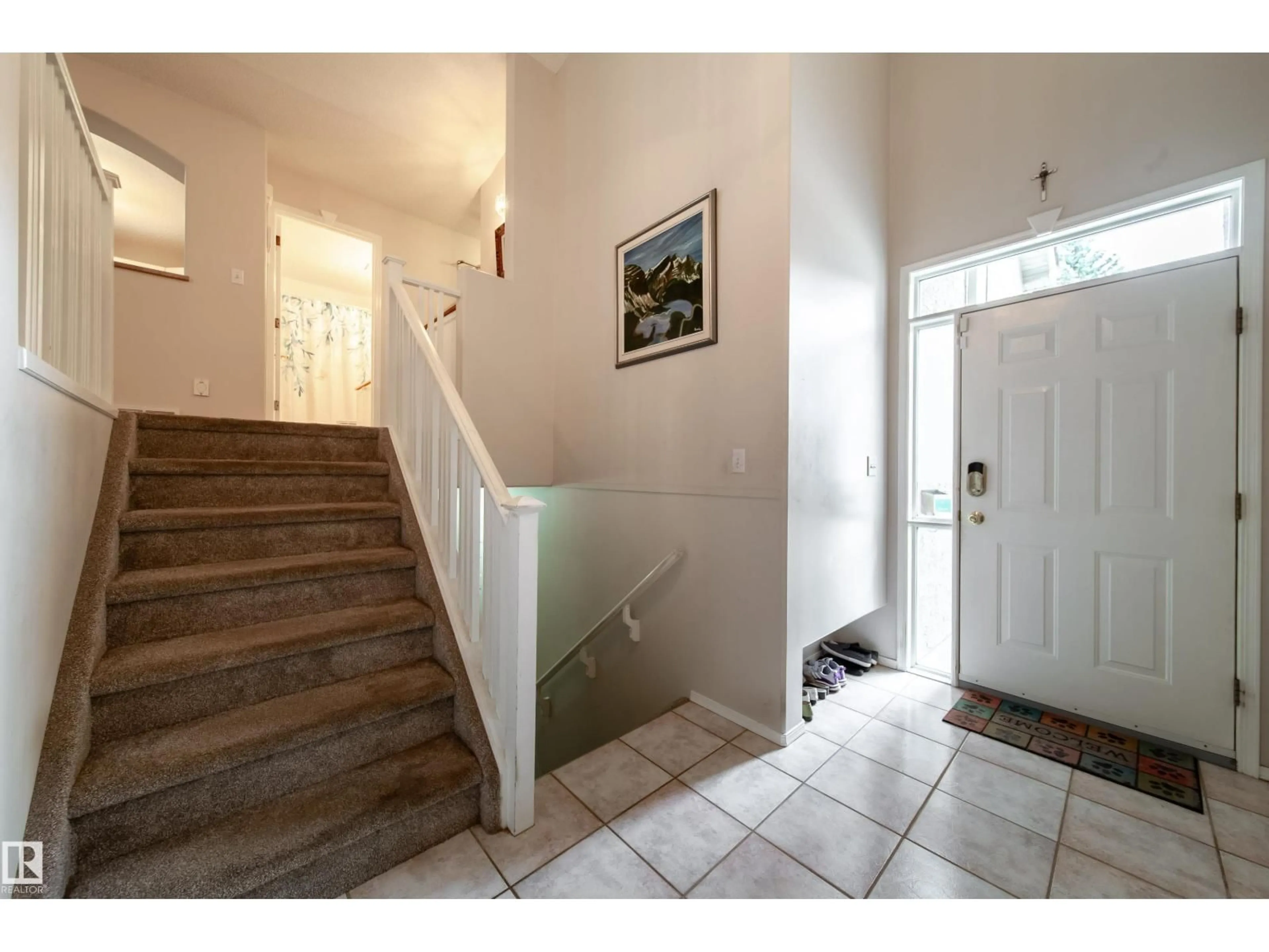 Indoor foyer for 7 - 1283 CARTER CREST RD, Edmonton Alberta T6R2N5