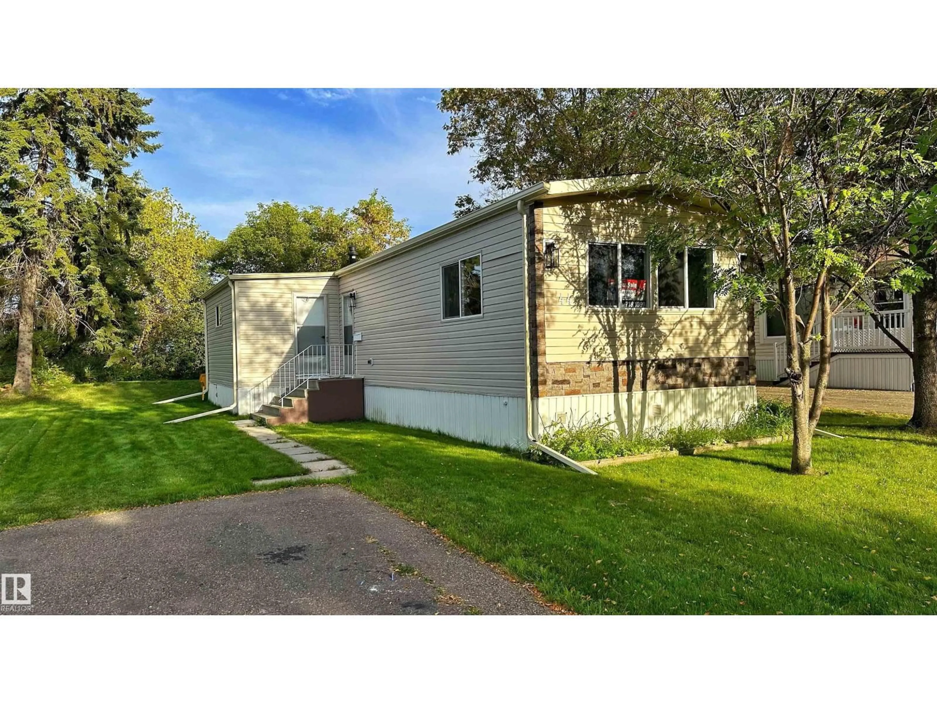 Home with vinyl exterior material, street for 44 RIM RD, Edmonton Alberta T6P1G7
