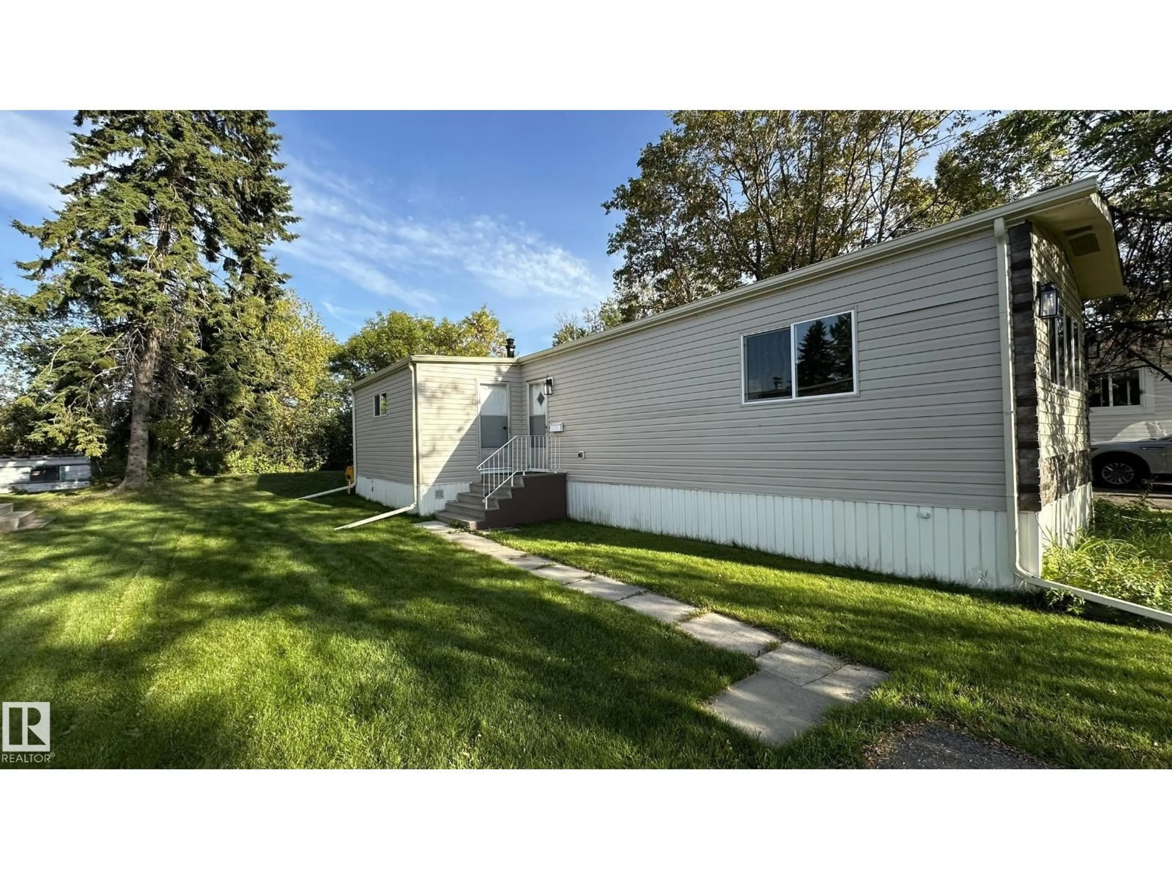 Home with vinyl exterior material, street for 44 RIM RD, Edmonton Alberta T6P1G7